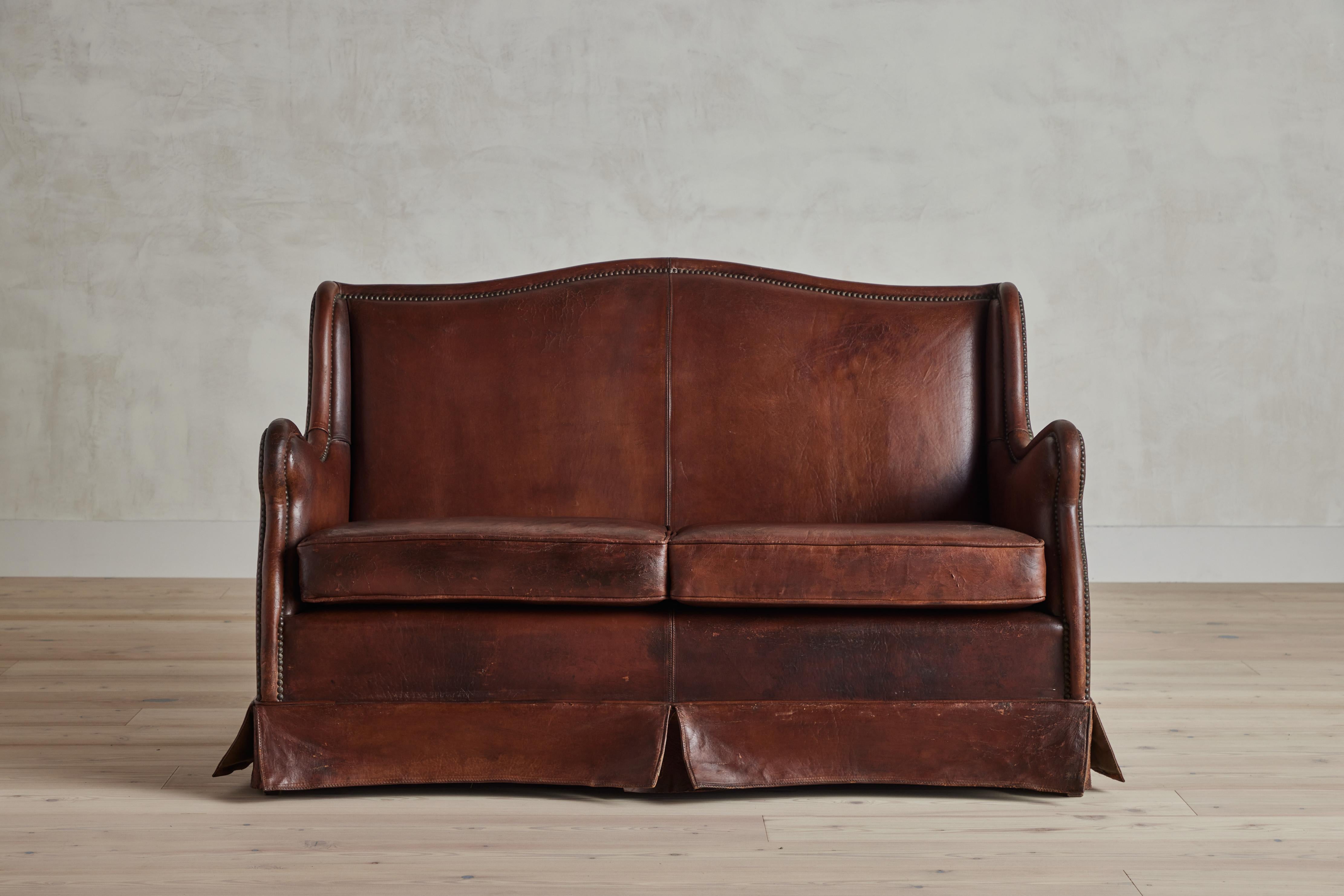 Leather settee from France circa 1930.

Dimensions: 51