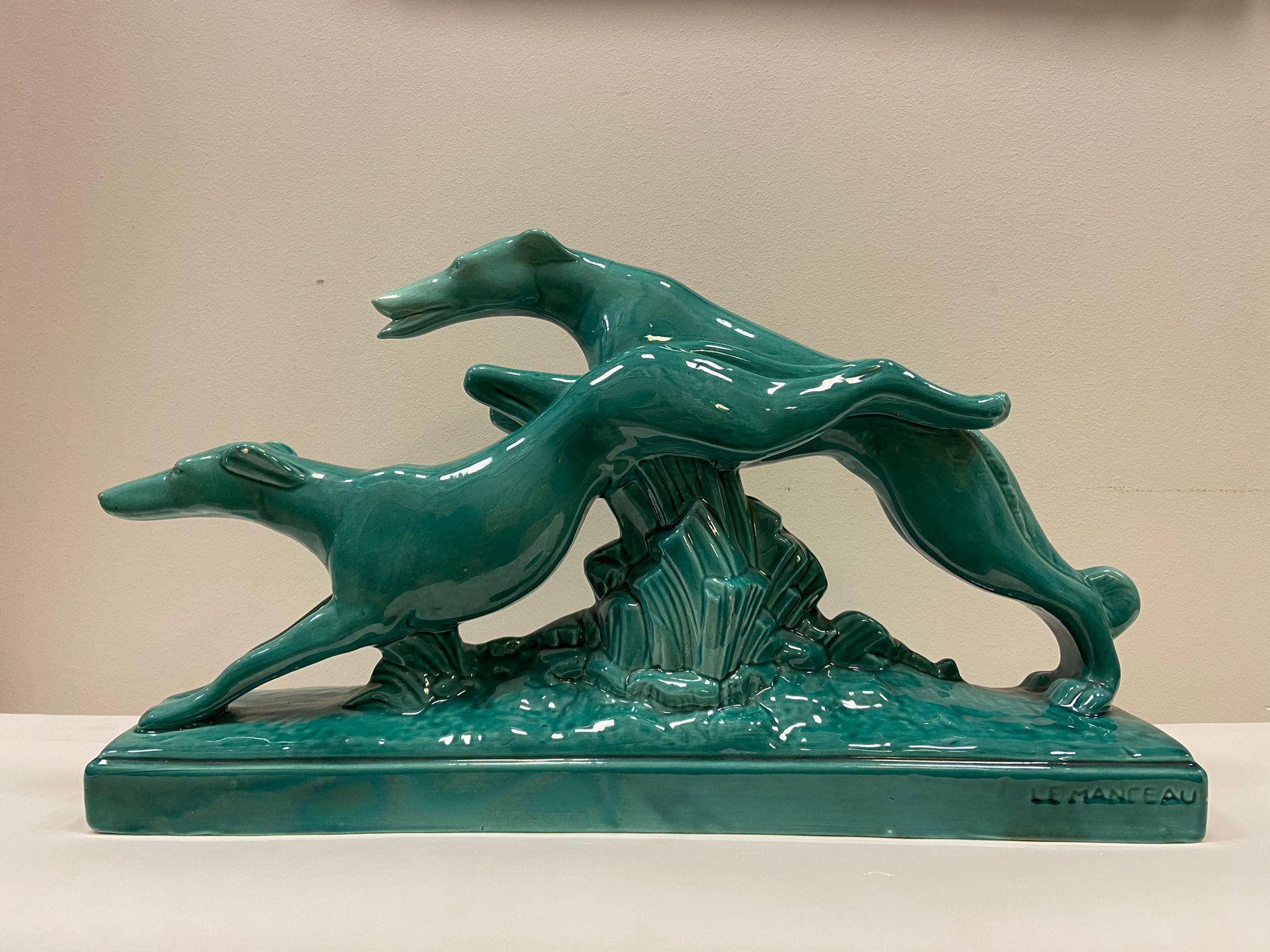 Outstanding pair of greyhounds sculpture made in glazed ceramic by Charles Lemanceau, one of the most important sculptors or potters of the French Art Deco period, especially renowned for his animal sculptures (bestiary). The main characteristic of