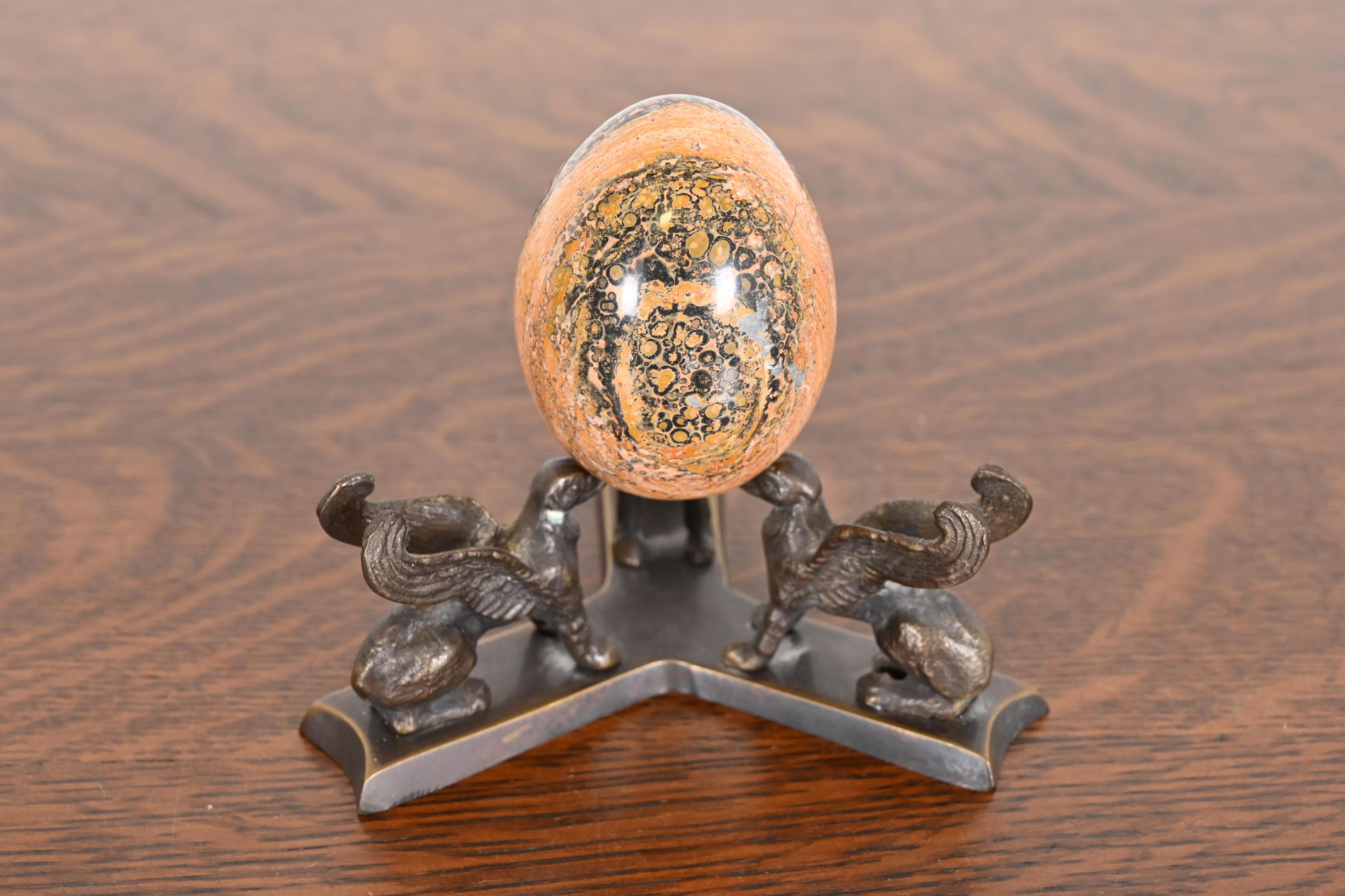 American Art Deco Leopard Skin Jasper Egg on Bronze Base With Griffins For Sale
