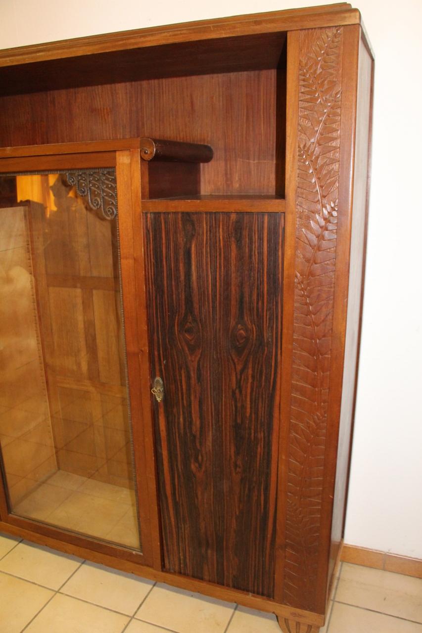Signed library of Gauthier poinsignon Nancy Art Deco period, mahogany and veneer of Macassar and wrought iron, in very good condition, has 3 shelves in each compartment signed on the front foot.