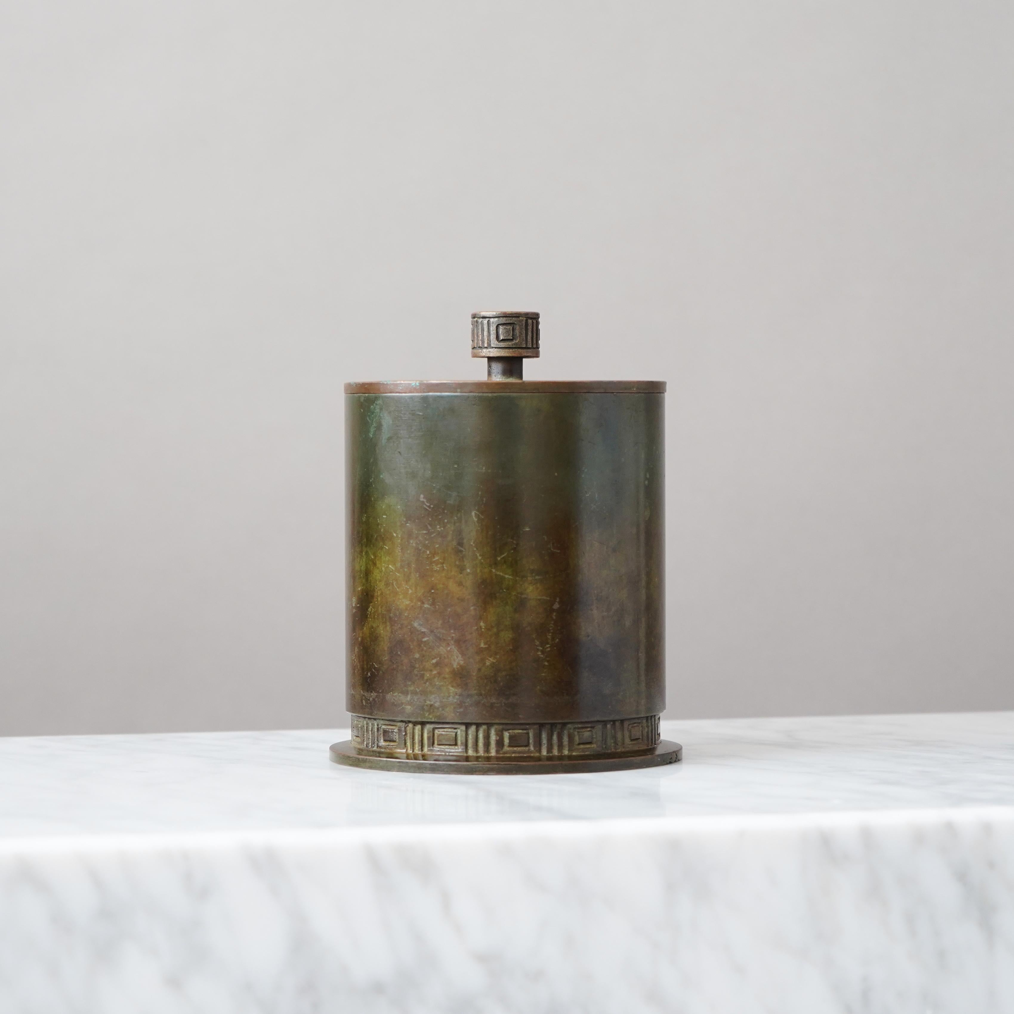 A beautiful lidded bronze box with amazing patina. 
Art Deco / Swedish Grace. 
Made by GAB Guldsmedsaktiebolaget, Sweden, 1930s.  

Good condition, with some scratches, scuffs and wear to the patination.
Stamped 'BRONS' and makers mark.
