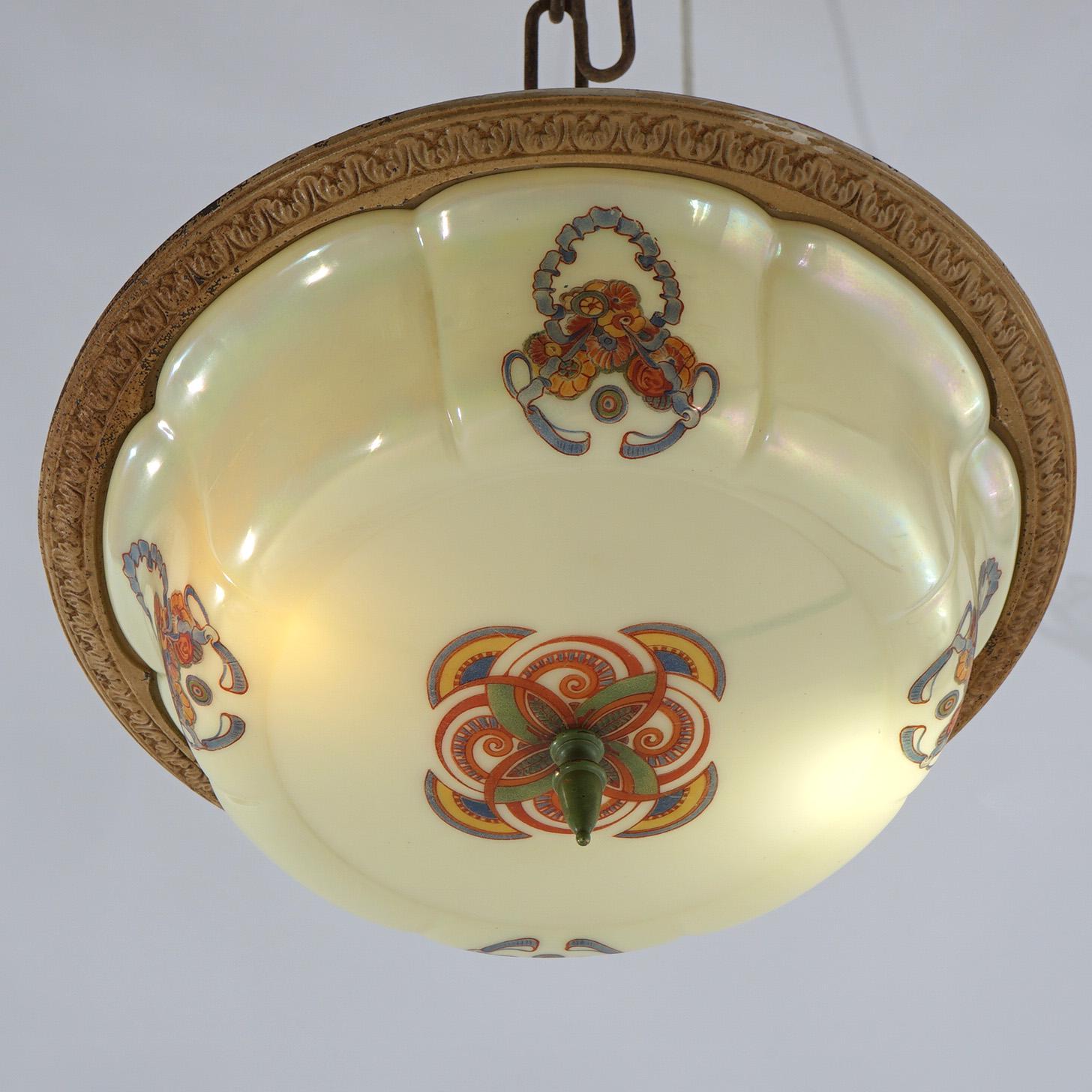 An antique Art Deco low profile flush mount light fixture by Lightolier offers hand painted opalescent glass shade with cast frame and two sockets, c1920

Measures- 7''H x 13.75''W x 13.75''D