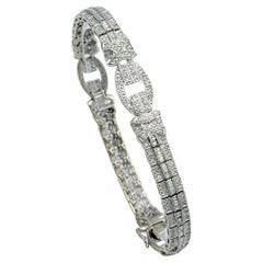 Art-Déco-Gliederarmband aus 18 Karat Weißgold mit Baguette- und runden Diamanten