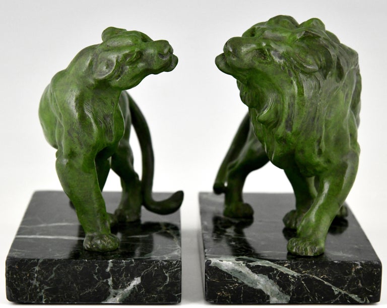 Patinated Art Deco Lion Bookends by the French Artist Emile Carlier, 1930