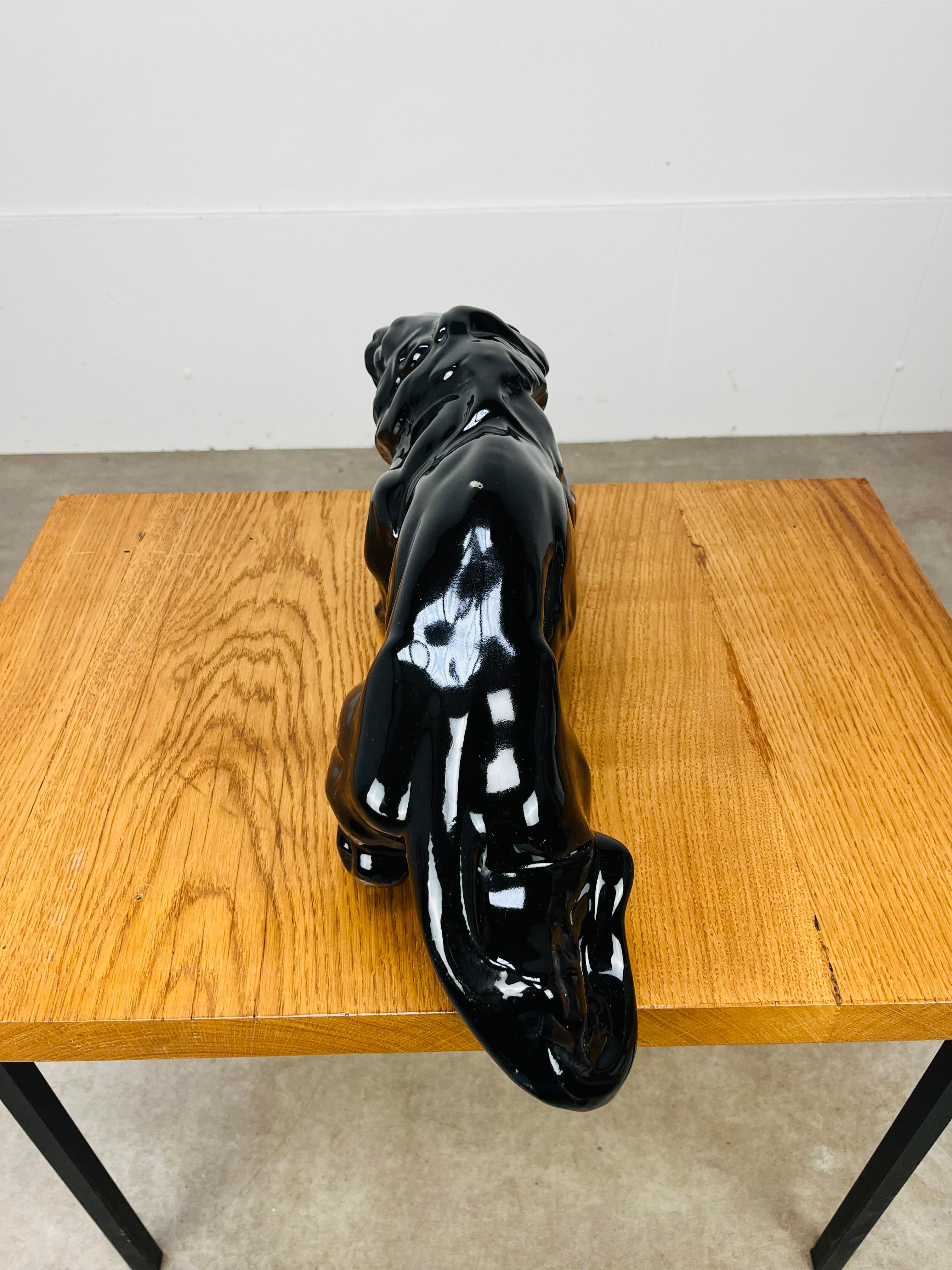 Art Deco Lion sculpture, black ceramic, 1930's, in the style of Saint-Clément In Good Condition For Sale In BELFORT, FR