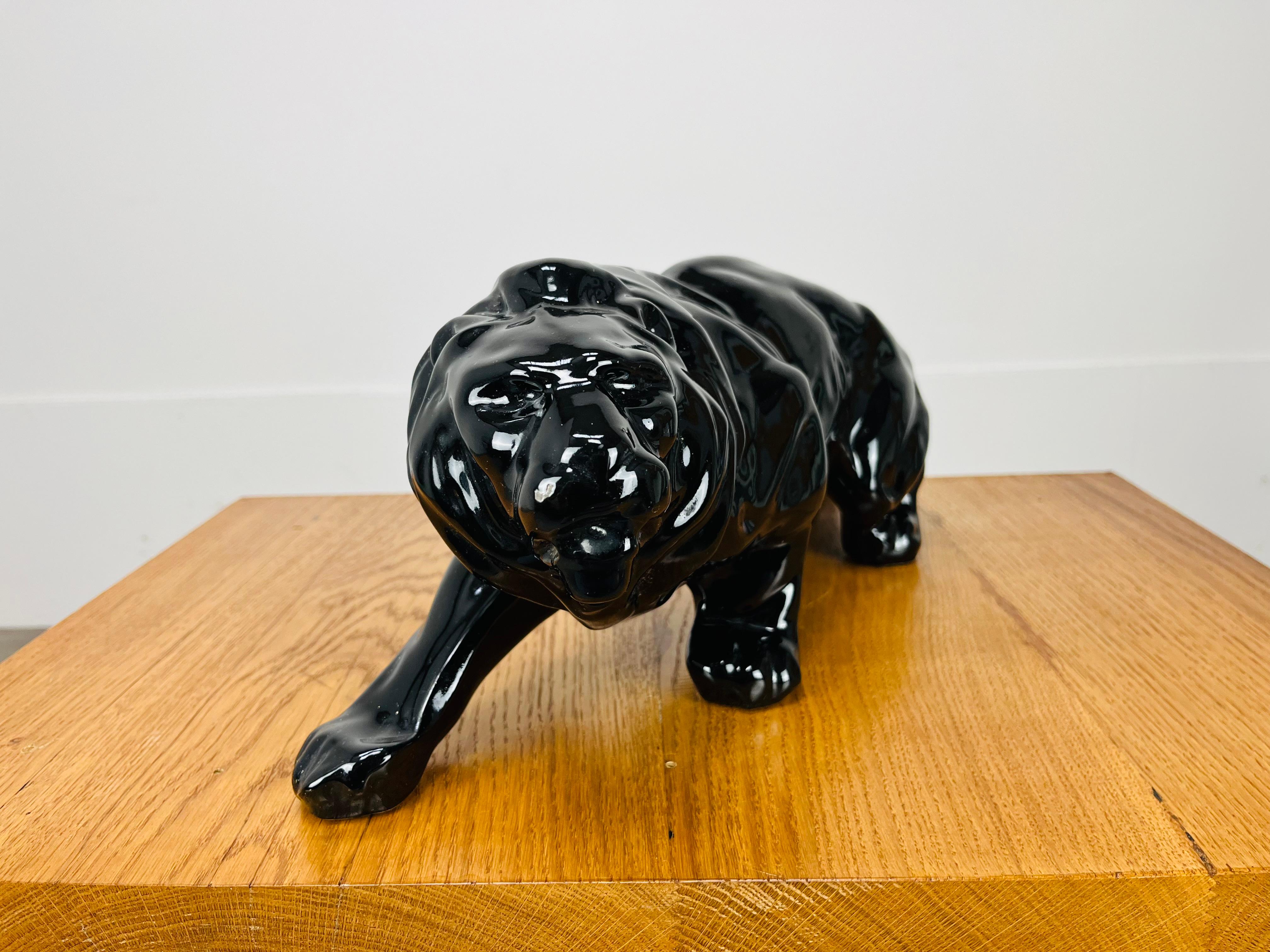 Art Deco Lion sculpture, black ceramic, 1930's, in the style of Saint-Clément For Sale 1