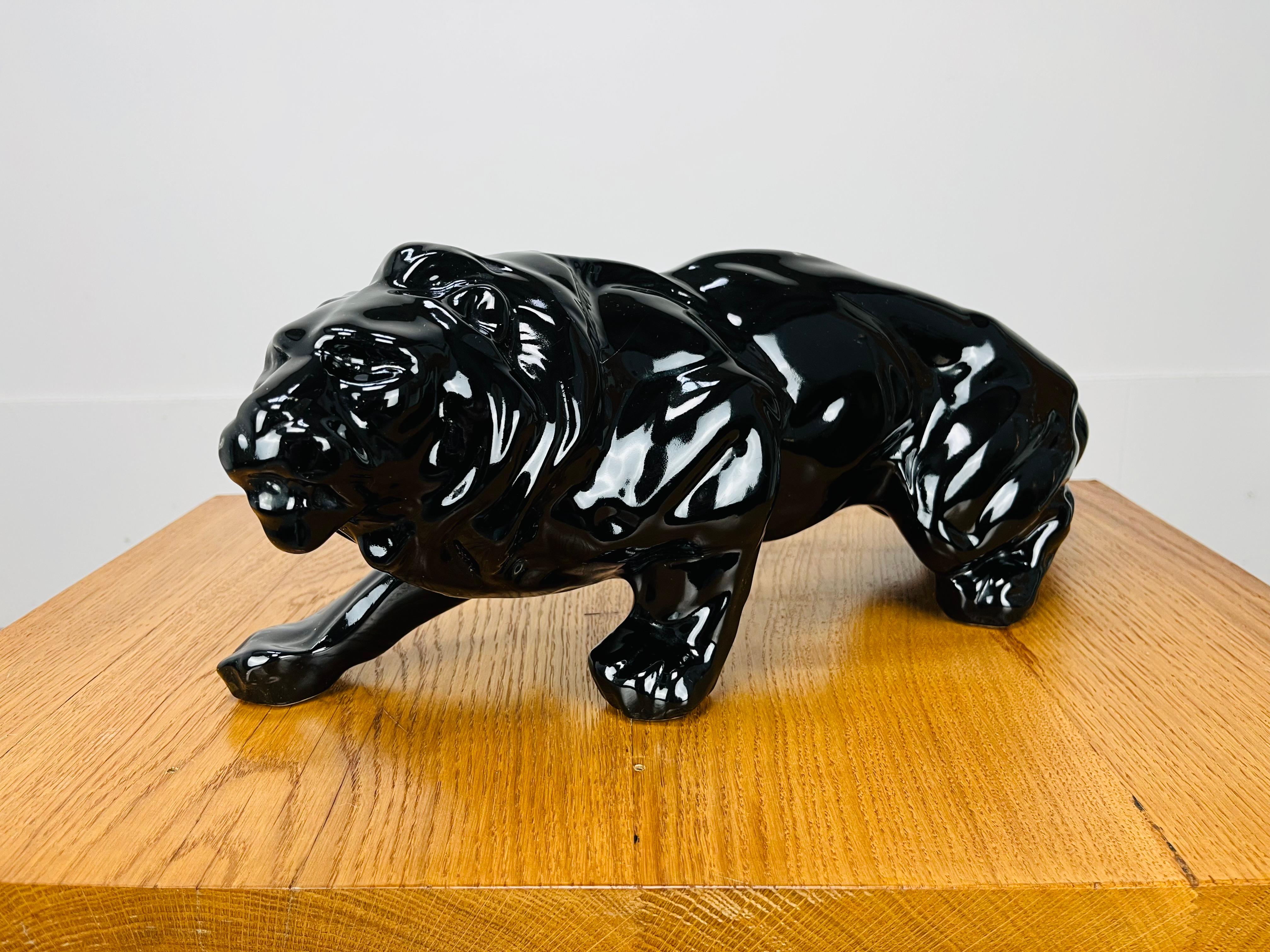 Art Deco Lion sculpture, black ceramic, 1930's, in the style of Saint-Clément For Sale 2