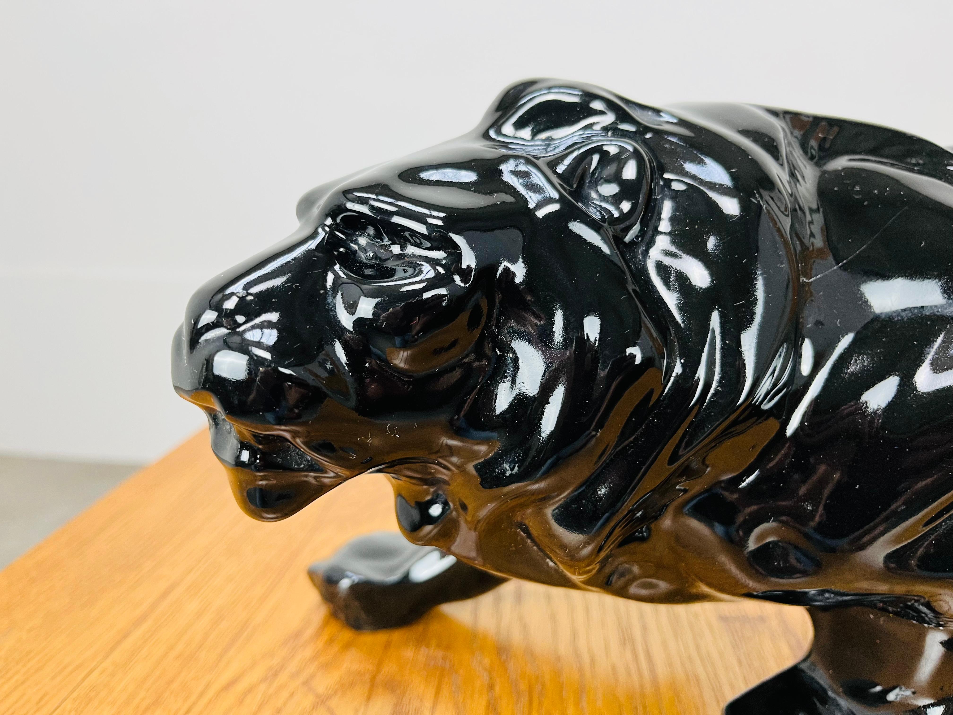 Art Deco Lion sculpture, black ceramic, 1930's, in the style of Saint-Clément For Sale 3