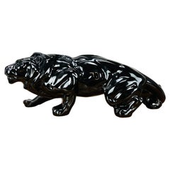 Art Deco Lion sculpture, black ceramic, 1930's, in the style of Saint-Clément