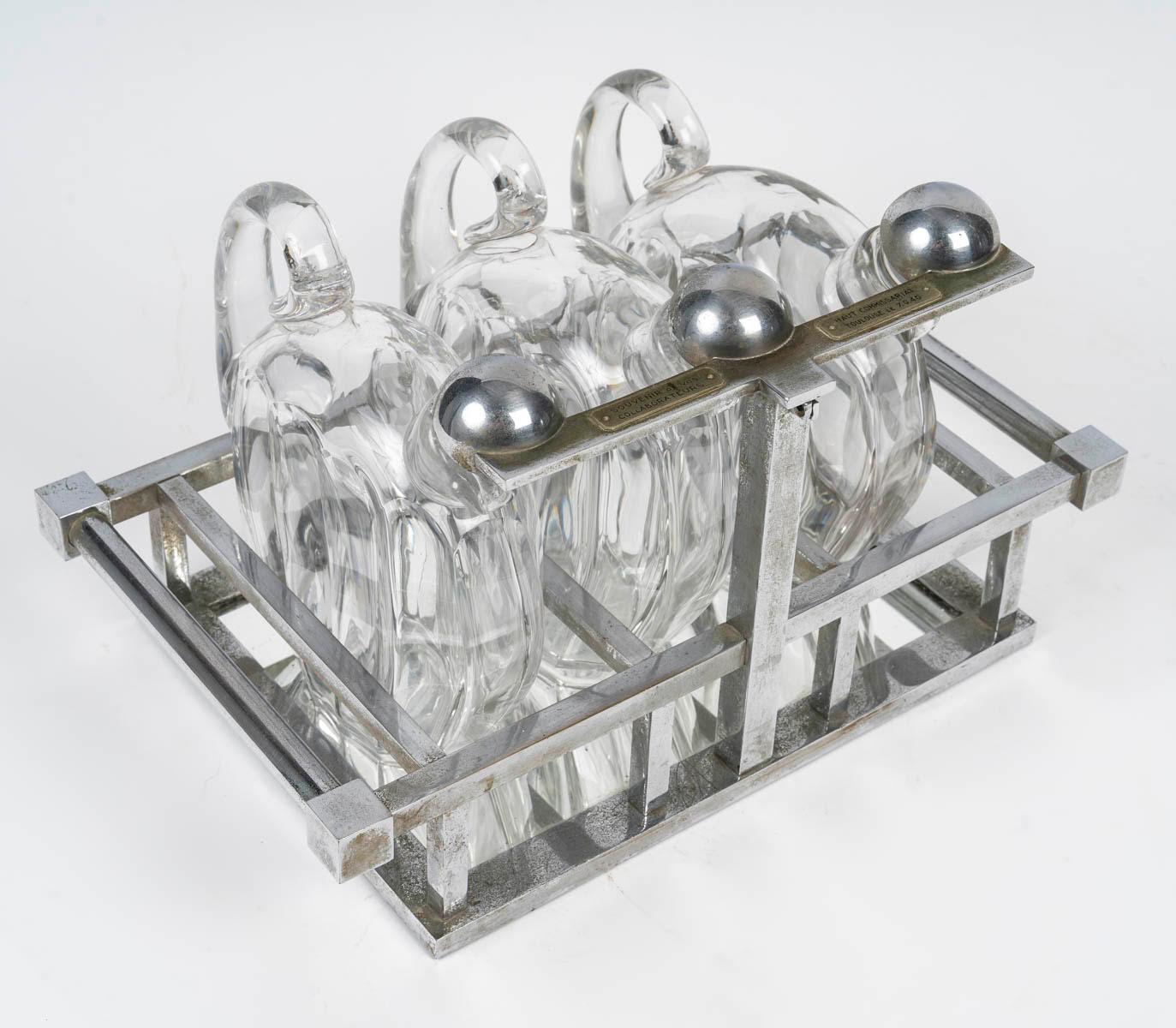 Licorera Art Decó de Baccarat y Adnet, hacia 1930.

Licorera Art Decó de Baccarat et Adnet, hacia 1930.
Alto: 19 cm, Ancho: 34 cm, Fondo: 20 cm