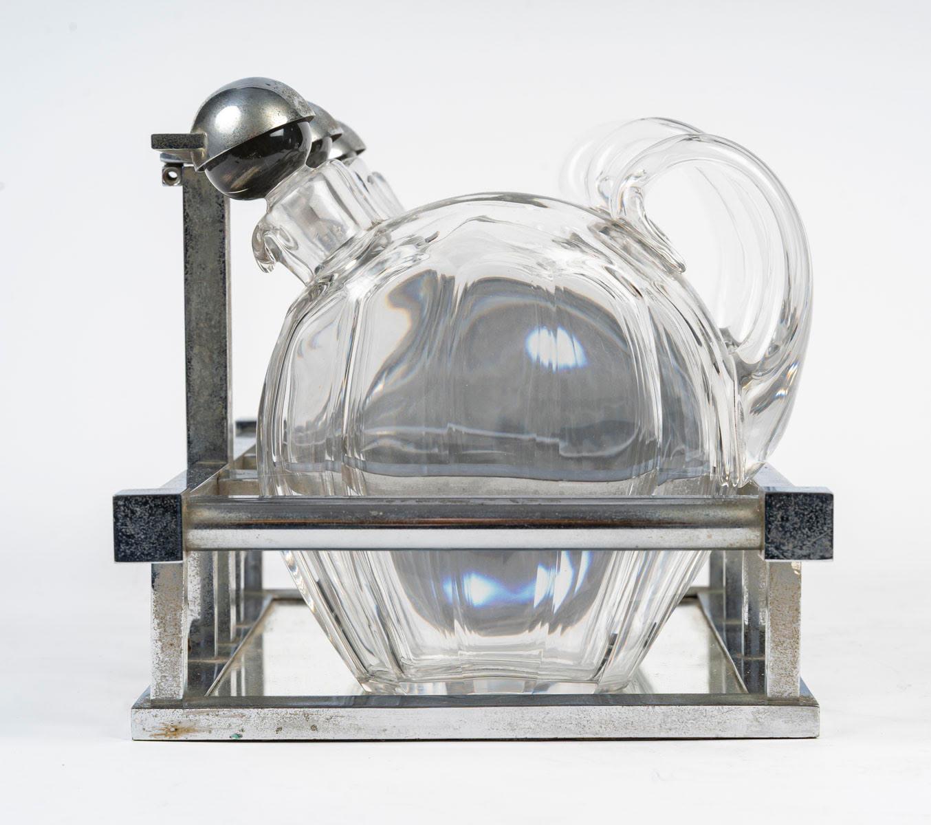Licorera Art Decó de Baccarat y Adnet, hacia 1930. Metal
