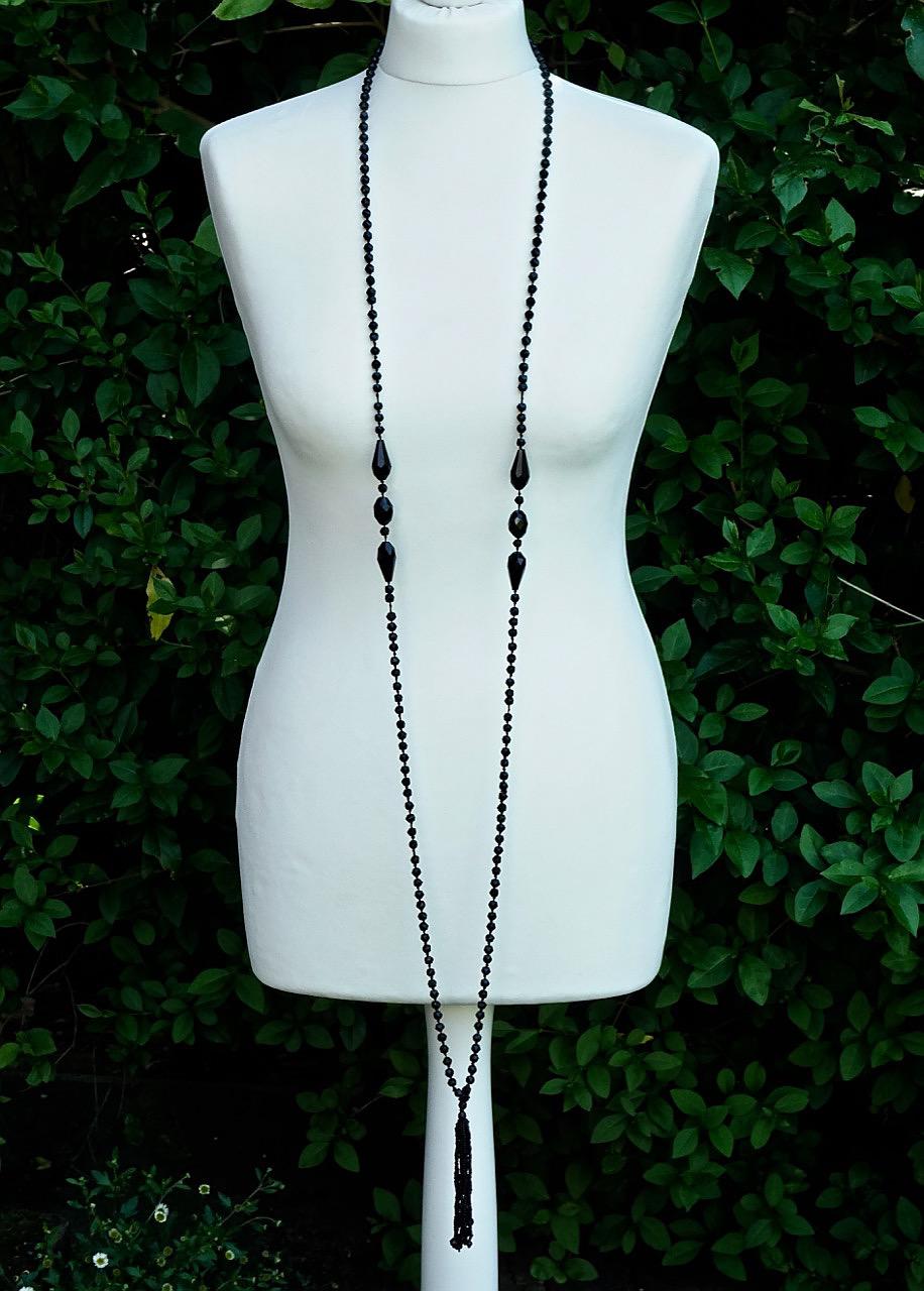 long beaded necklace with pendant