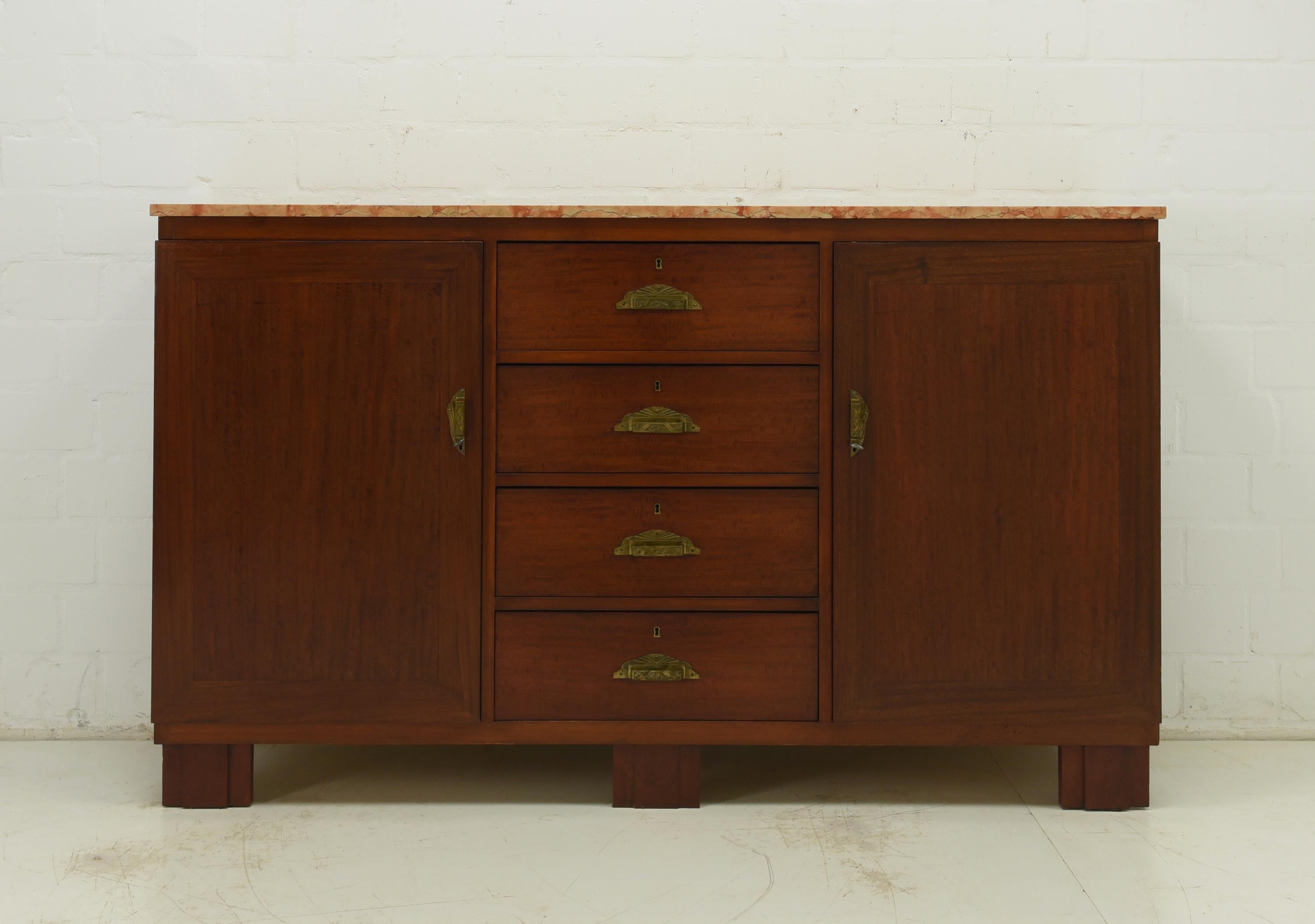 Sideboard restored Art Deco circa 1925 mahogany long sideboard

Features:
Inside partly solid oak, partly plywood
Two-door model with 4 drawers
Drawers pronged
Original rose marble top
Original rod locks
High-quality original Art Deco