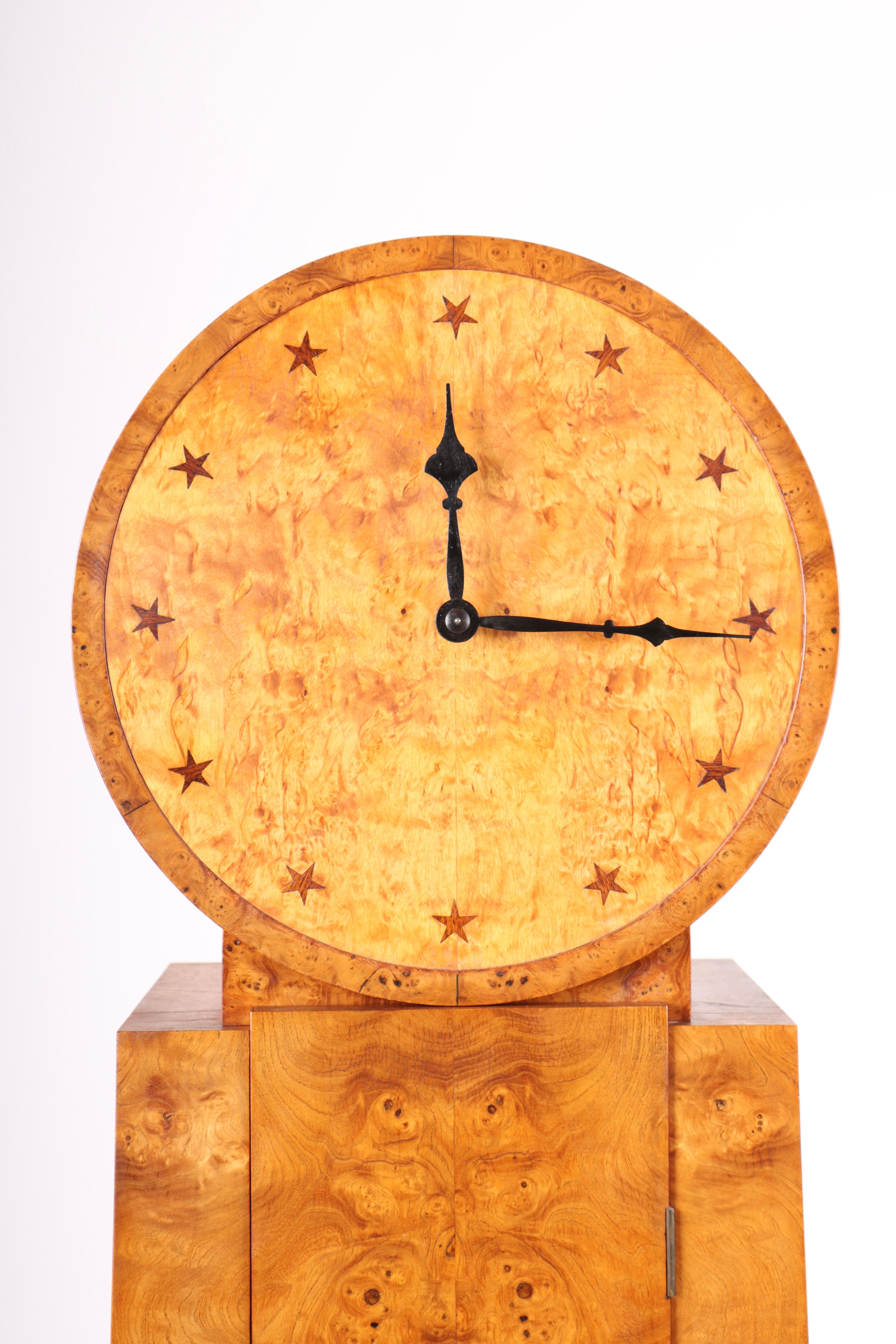 Floor clock in elm wood, design and made in Denmark 1930s. Great original condition.