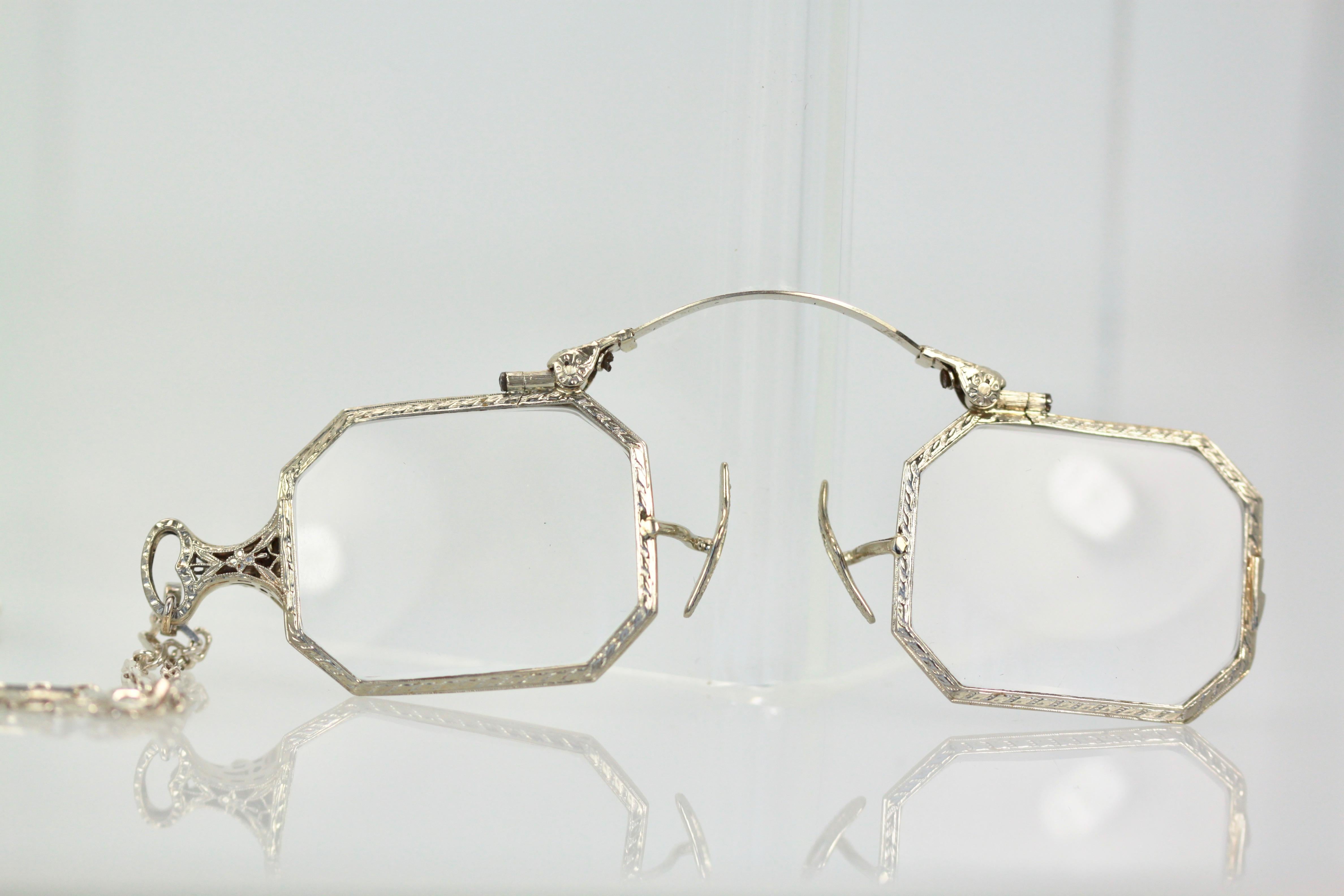 This lorgnette is done in 14K gold and it is lovely.  These pieces are great to wear when you are shopping and need to use glasses to see.  Just pop this open and you have a pair of glasses.  You can put your prescription into these frames or just