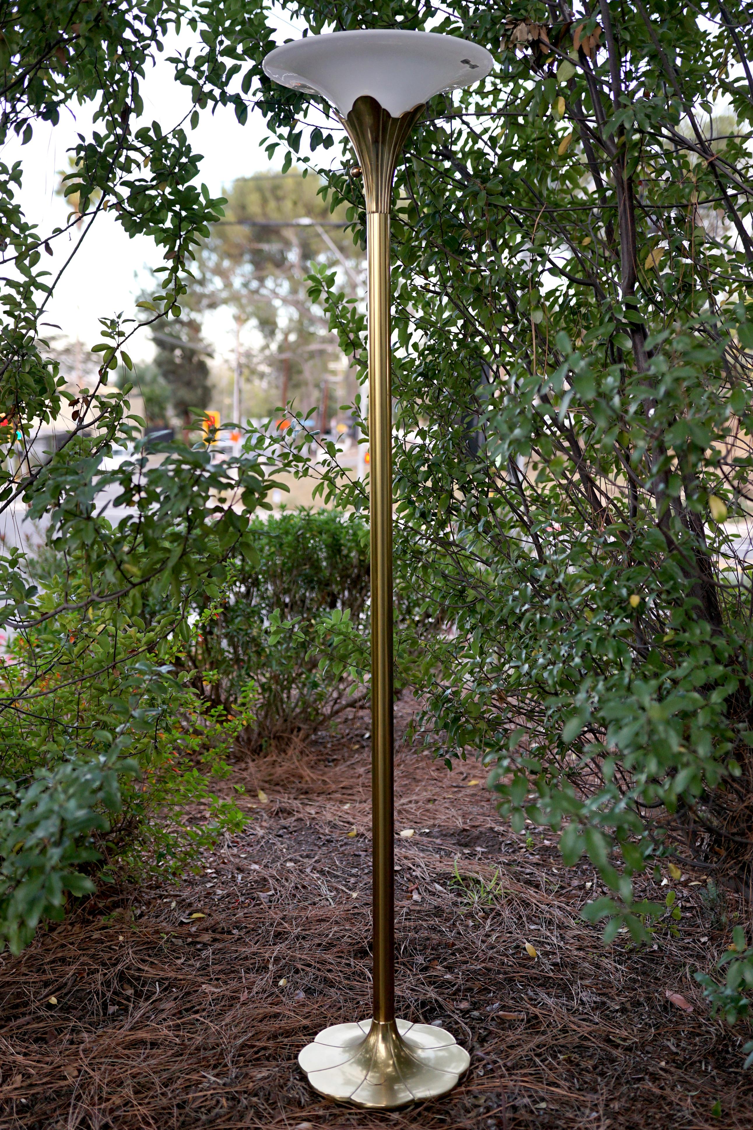Stiffel quality and style are evident the moment you lay eyes on this brass art deco style lamp. The silhouette with its trumpet-form nod to traditional art deco is a product from Stiffel manufacturing in the 1960s. This is a solid , well made brass
