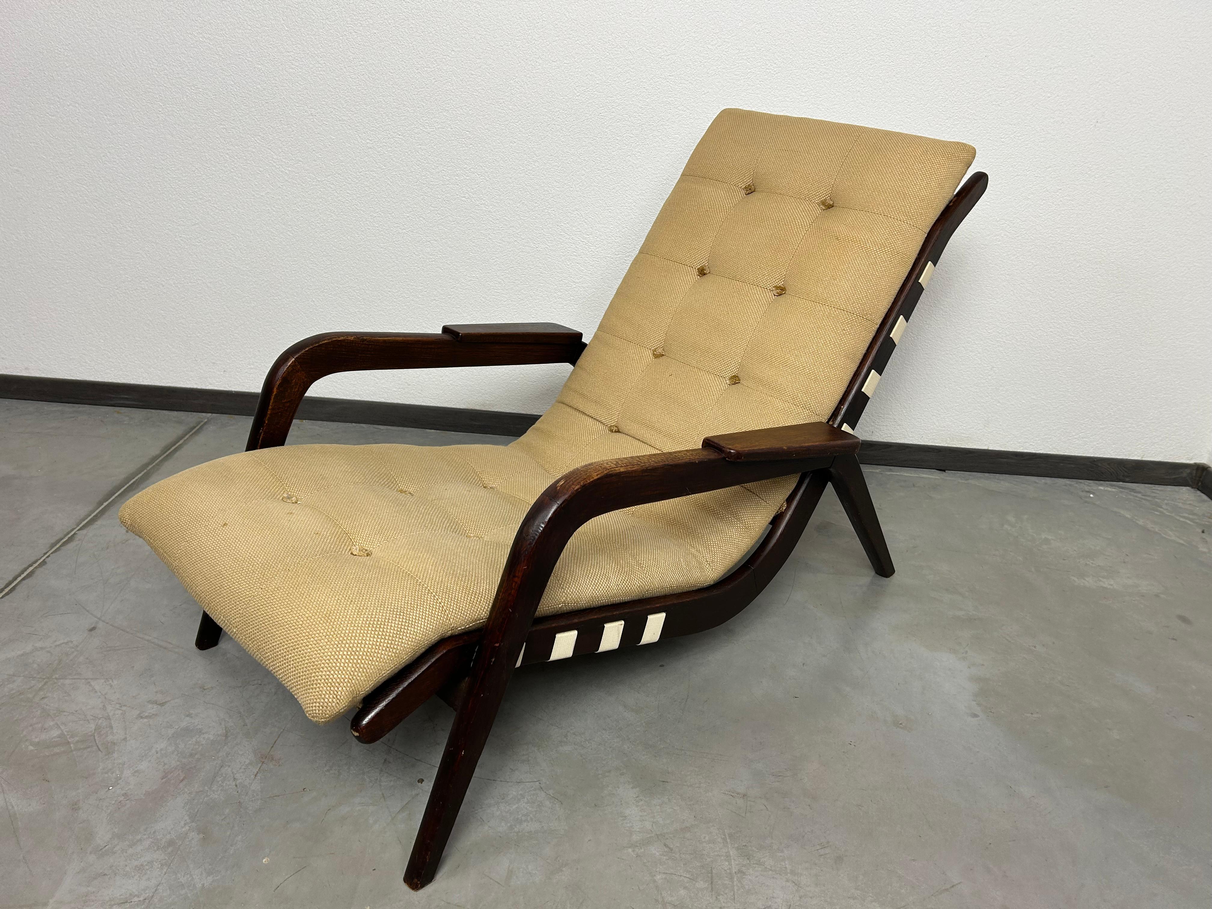Art deco lounge chair by Jan Vaněk in very good original condition with signs of use.