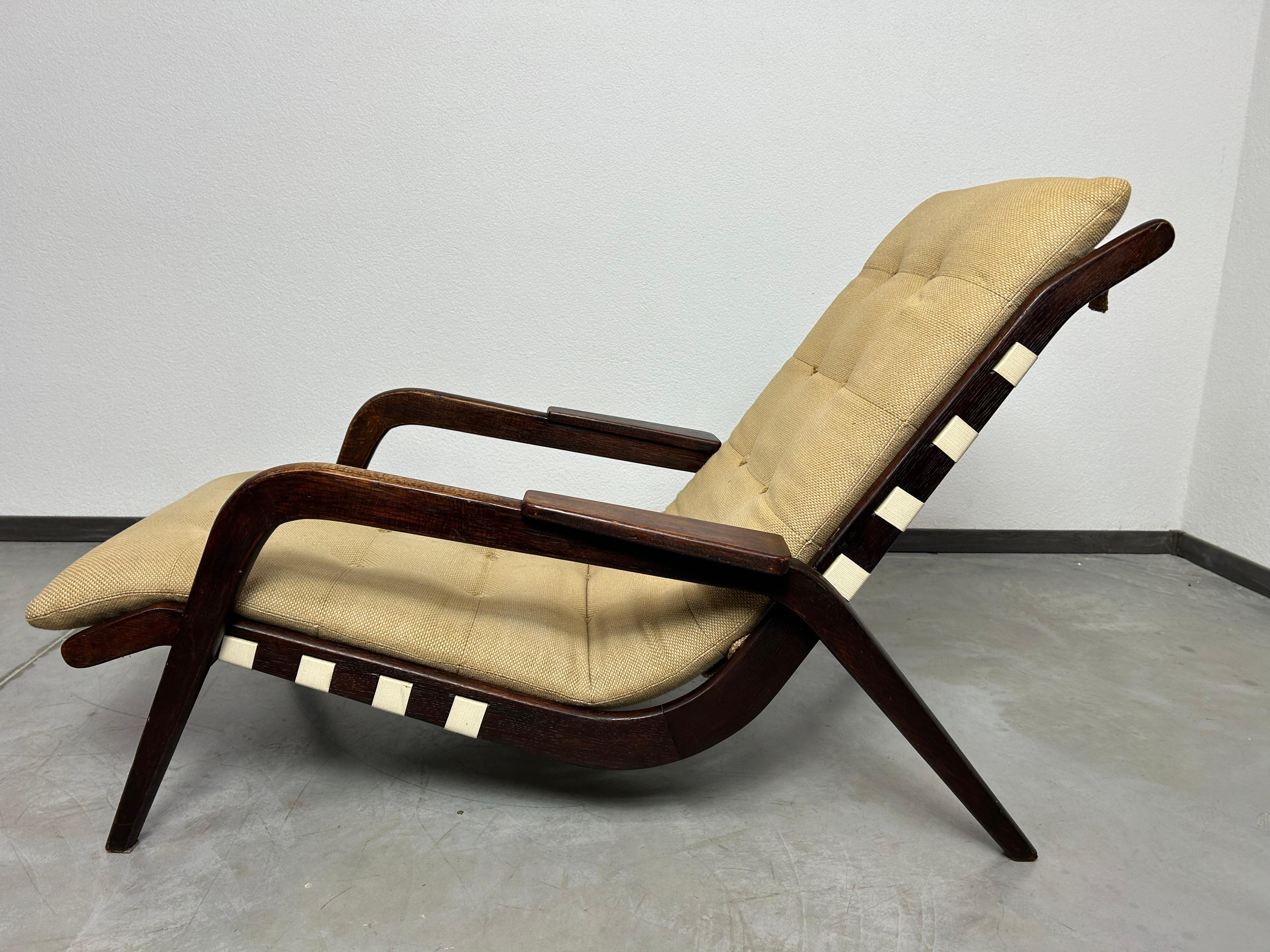 Wood Art deco lounge chair by Jan Vaněk