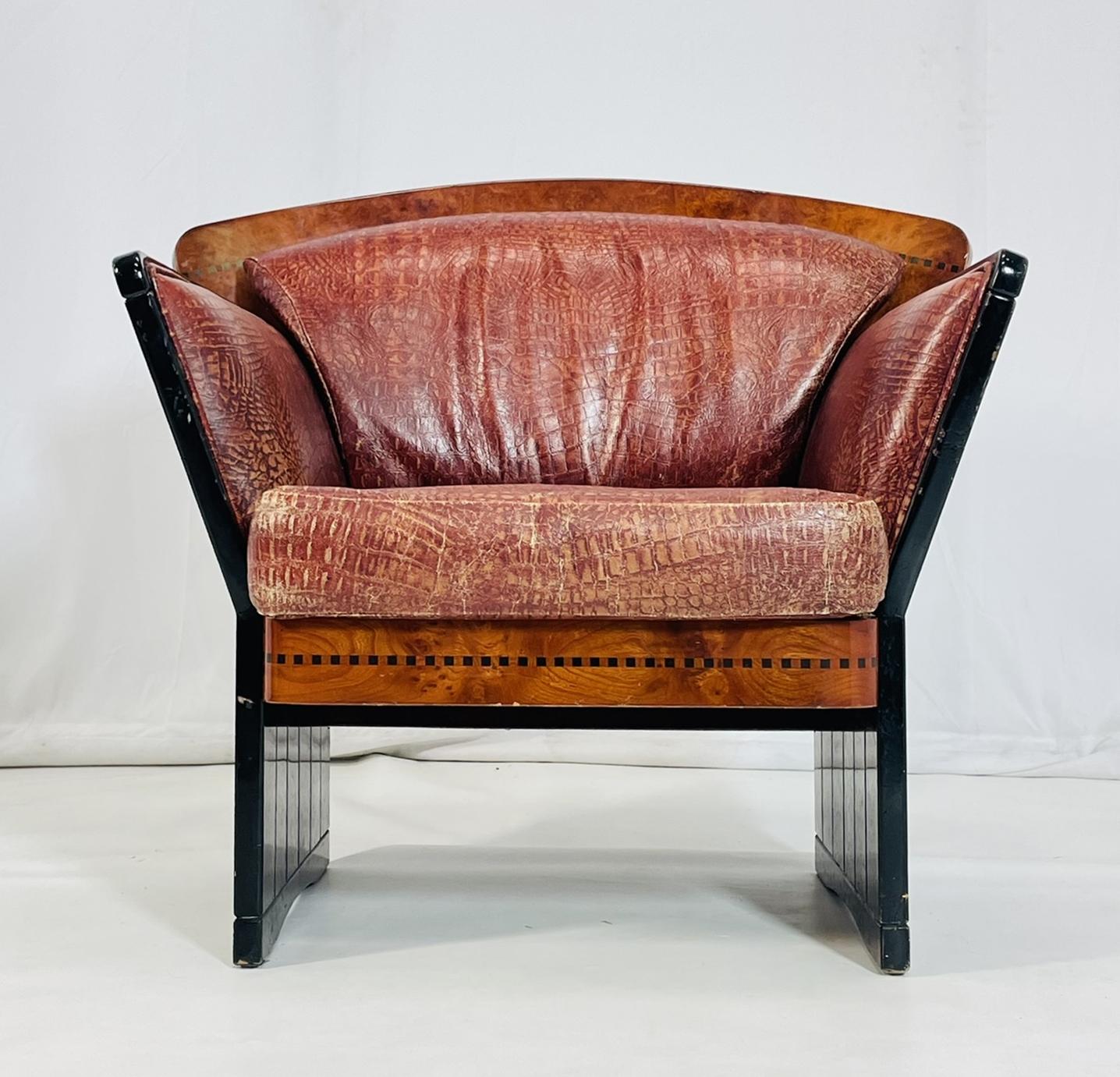 Introducing the exquisite Art Deco Lounge Chair in Burlwood & Leather, originating from France in the 1940s. This stunning piece features a rich burlwood frame with sleek, curved arms and legs, exuding elegance and sophistication. The brown leather