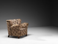 Poltrona in stile Art Déco con tessuto a motivi floreali e struttura in legno