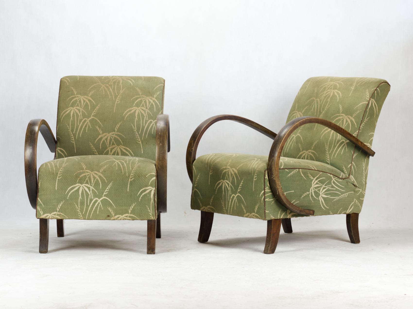 This lounge chairs, model C, were designed by Jindrich Halabala and produced in former Czechoslovakia in the 1930s by UP Zavody Brno. The the chairs are in their original condition and will require new upholstery.