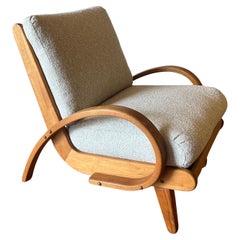 Sillón bajo Art Decó Cojines de muelles Tapicería nueva Arce macizo