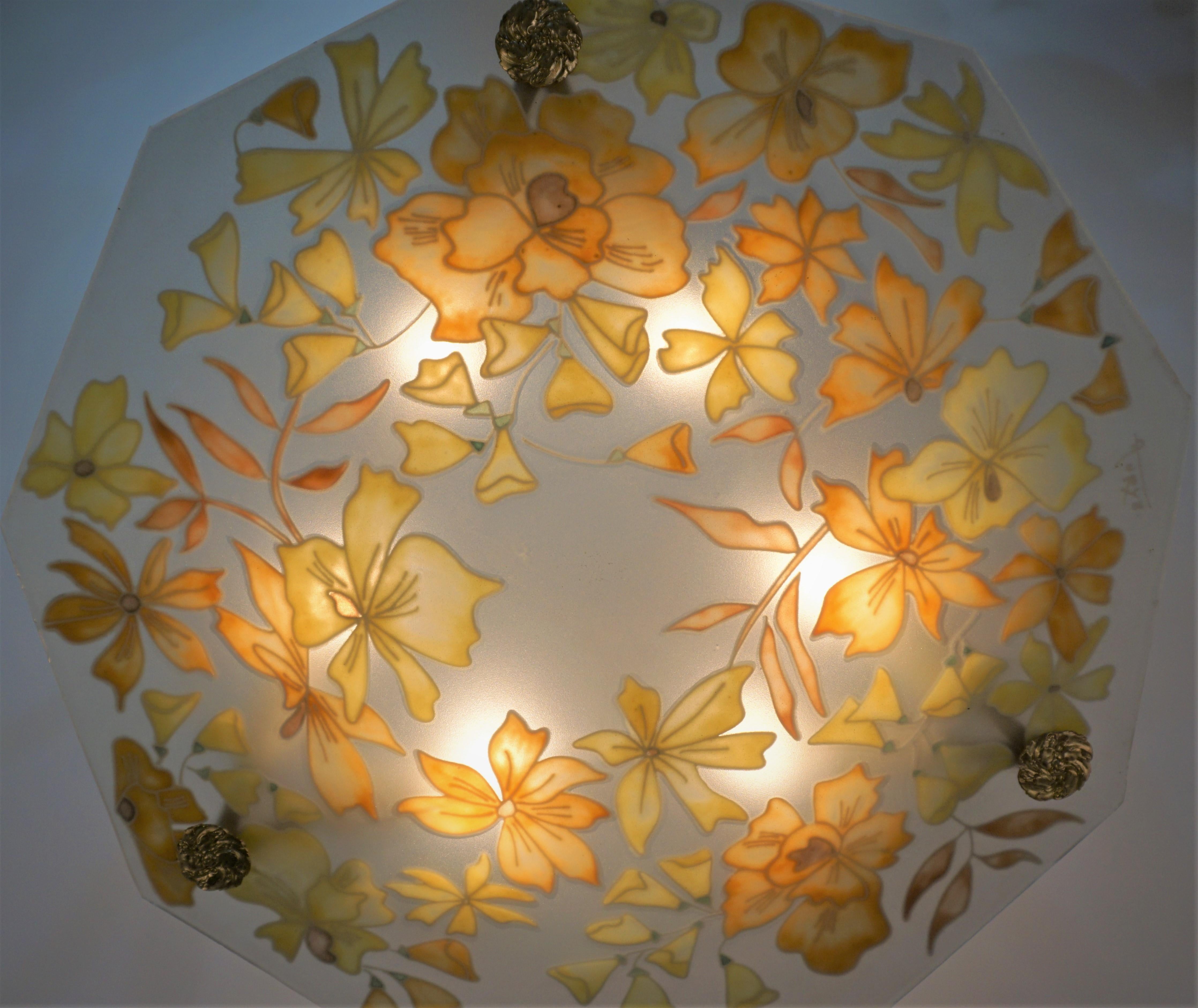Clear frosted painted glass ceiling light chandelier features a floral design in yellow and orange with bronze chain and hardware, signed.
Professionally rewired and ready for installation.
Six lights, 60 watts max each.