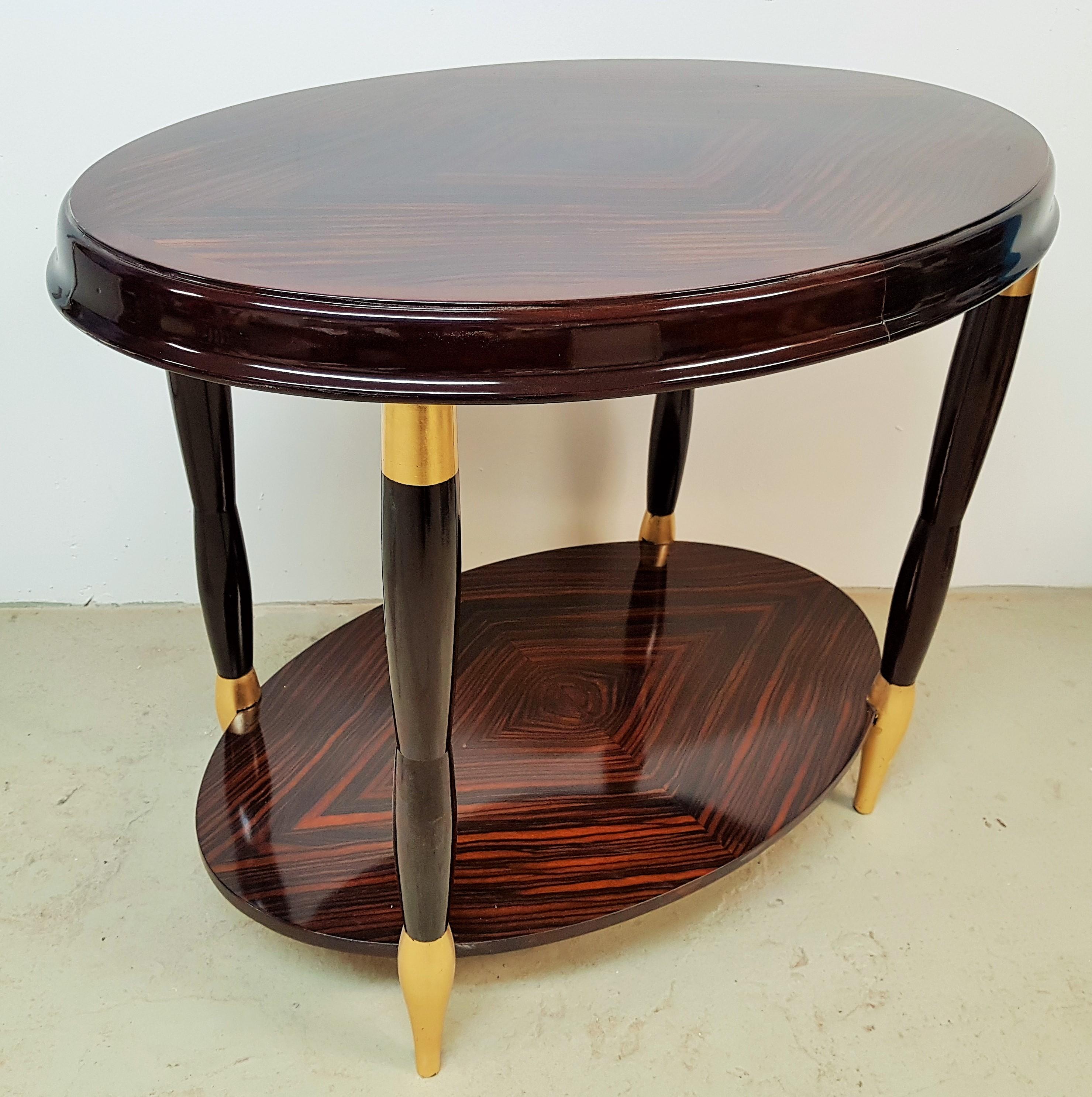 Art Deco Macassar veneer side table, France, 1925. Fully restored hand polished in high gloss two components varnish! Gold leaf details.

 