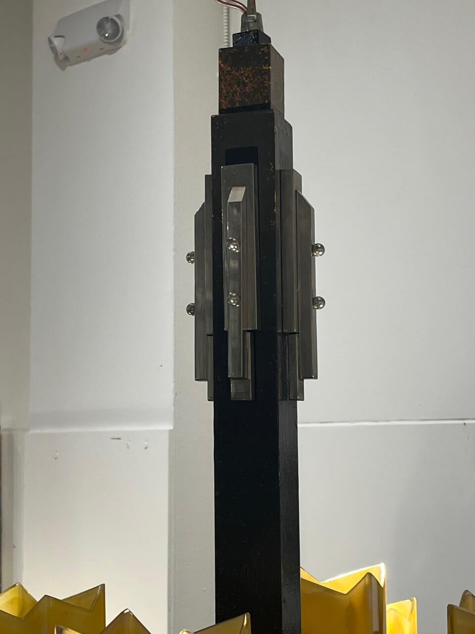 This elegant Art Deco chandelier is composed nickeled bronze and eight Italian glass shades.
The light requires eight single E27 screw fit light bulbs (60Watt max.) LED compatible.
Measures: Diameter 25