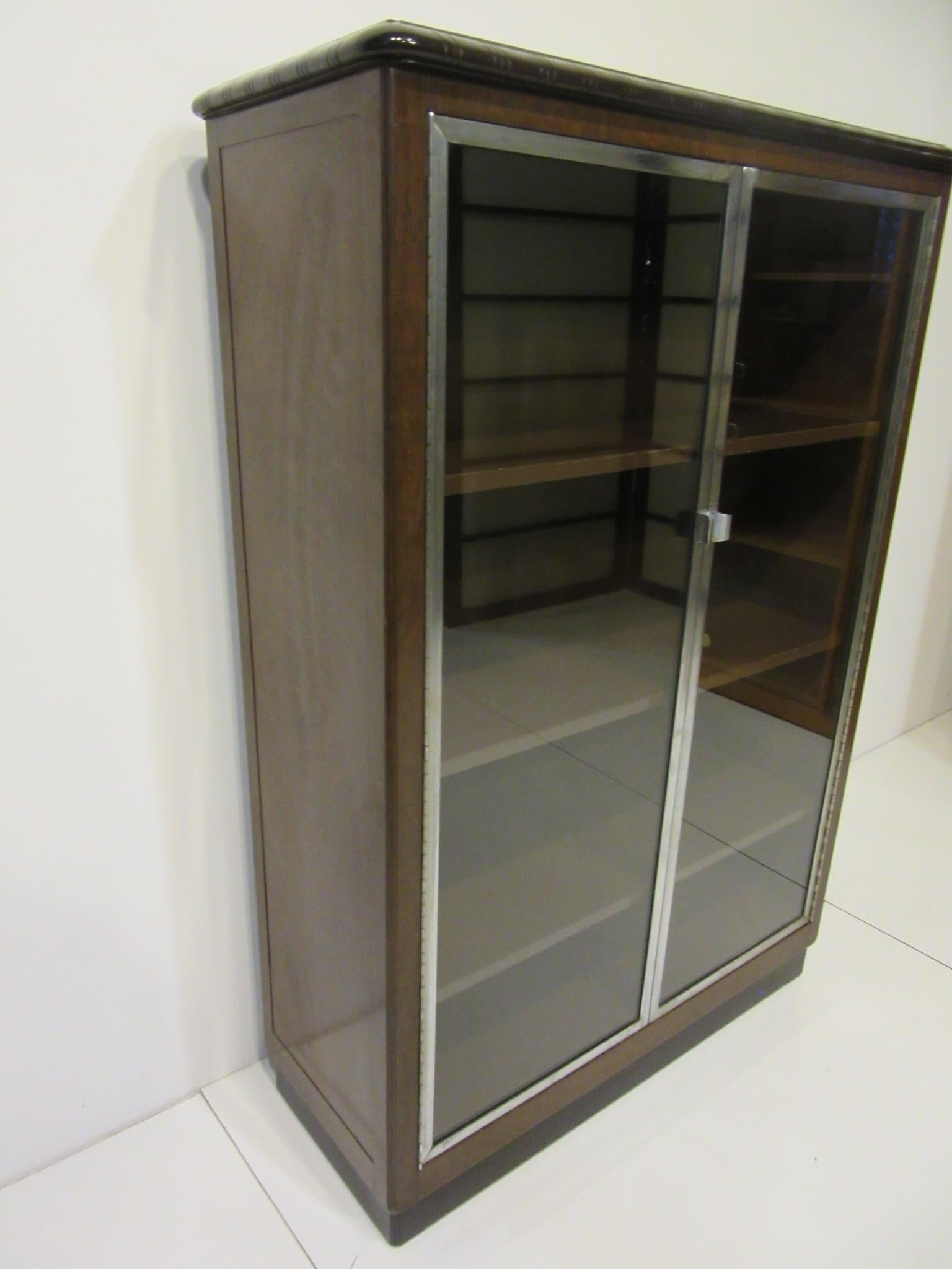 metal bookcase with glass doors