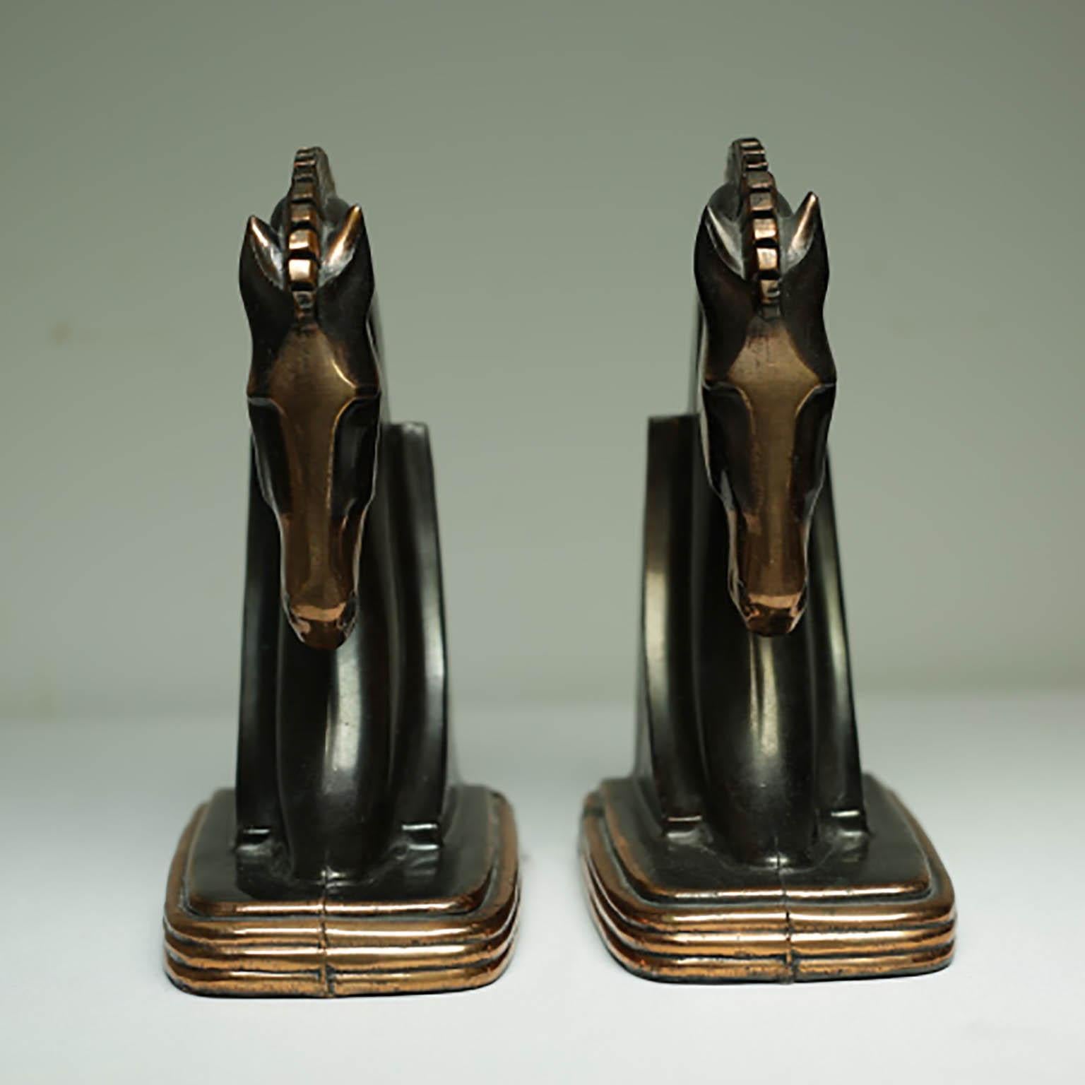 Pair of beautiful two-tone Art Deco bronze/copper-plated Trojan horse bookends by Dodge Inc.