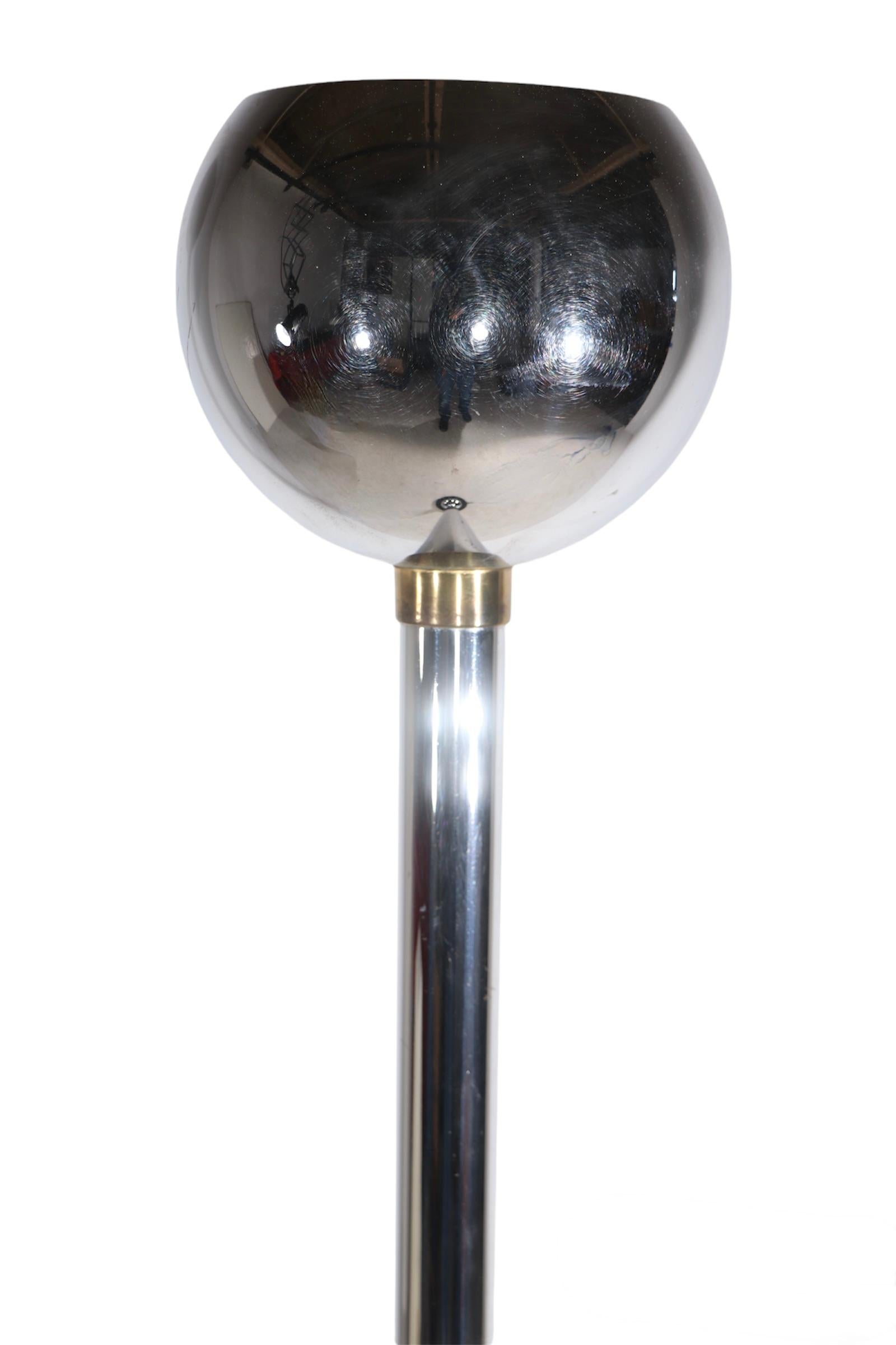 Rare Machine Age, Art Deco chrome and black uplight, torchiere, in very good, original, clean and working condition. Circa 1930's design in the style of Rohde, Deskey, Von Nessen etc, unsigned. Round ball top ( 10 in Dia. ) on tubular chrome center