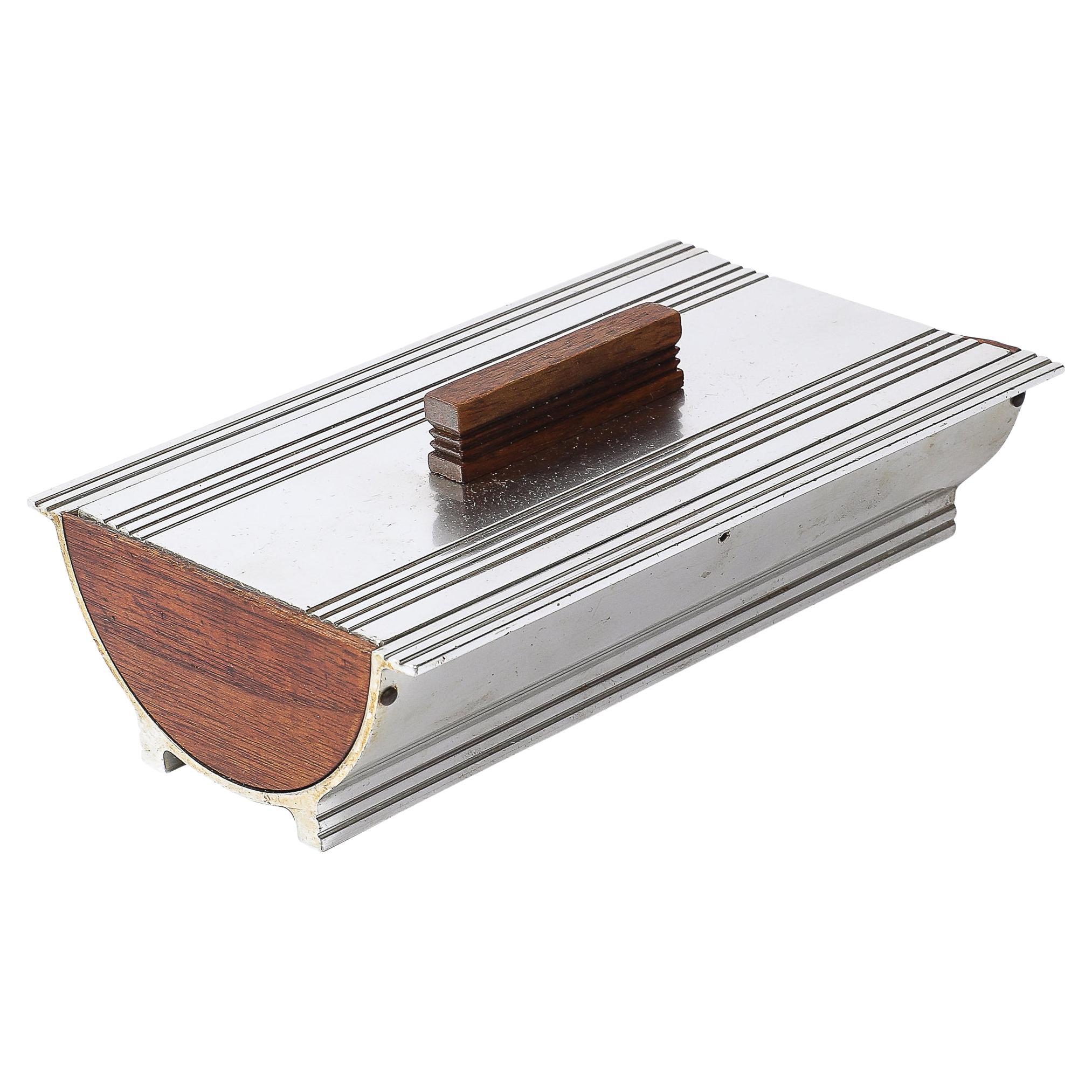 Art Deco Machine Age Cigarette Box in Aluminum 
Walnut signed Kensington For Sale
