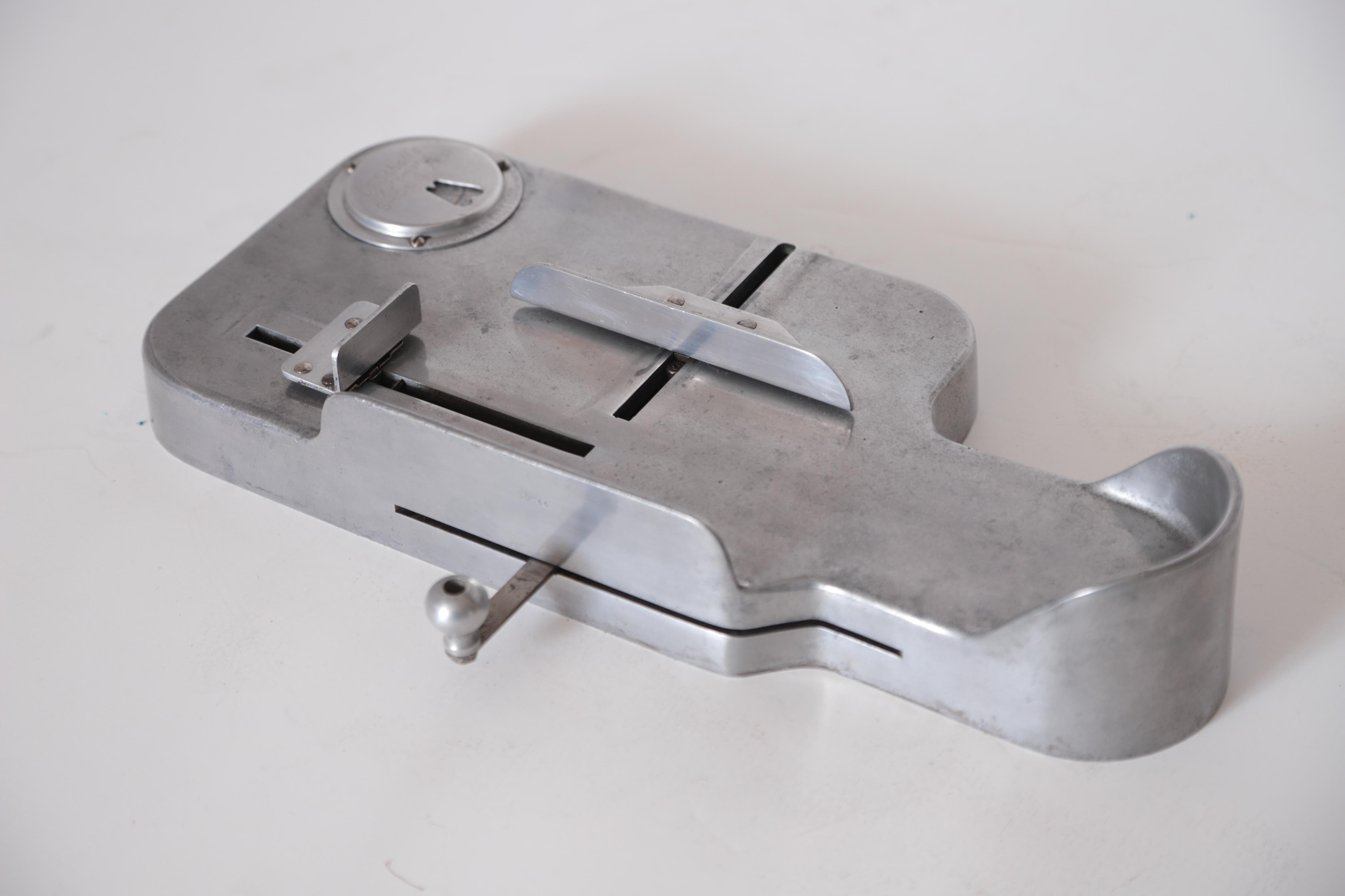 Art Deco Machine Age industrial design patented Dr. Scholl's Automatic Shoe-Sizer computer

Very rare early industrial re-deign, circa 1929-1931.
Cast and machined aluminum.
Automatically measures width and length for shoe-size conversion with