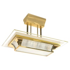 Lustre Art Déco en laiton poli à tige de verre de l'âge de Machin par PETITOT
