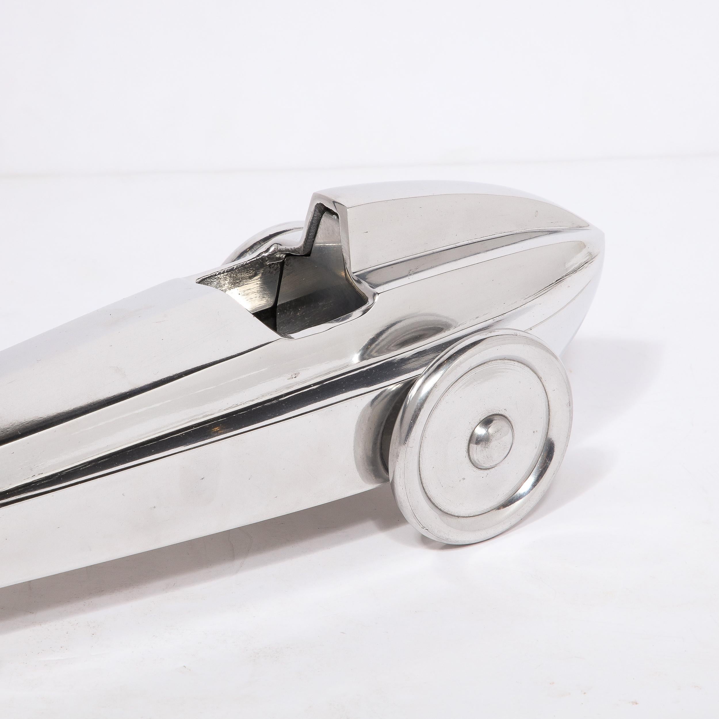 Art Deco Machine Age Polished Nickel Streamlined Race Car Sculpture In Excellent Condition In New York, NY