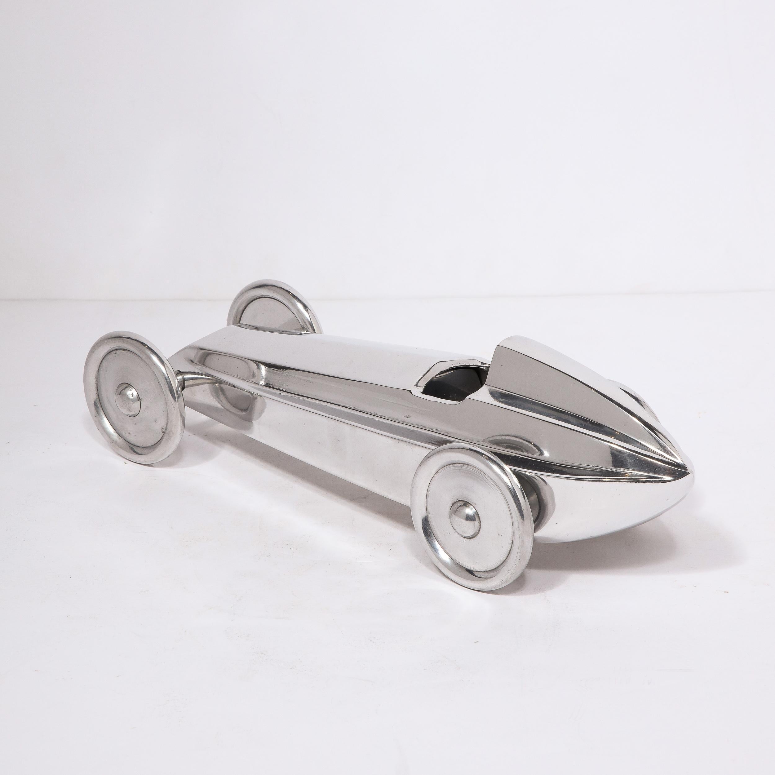 Mid-20th Century Art Deco Machine Age Polished Nickel Streamlined Race Car Sculpture