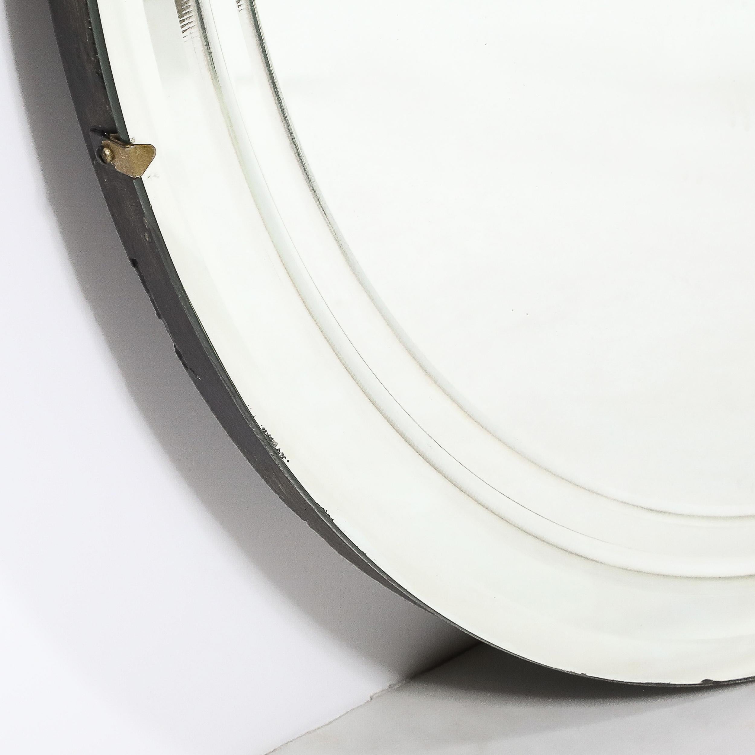 Américain Art Deco Machine Age Round Reverse Tiered Bevel Detailed & Brass Clips Mirror en vente