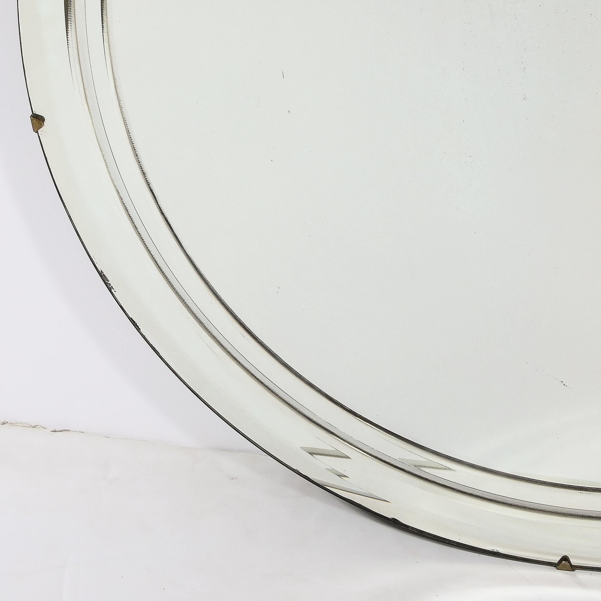 Art Deco Machine Age Round Reverse Tiered Bevel Detailed & Brass Clipped Mirror For Sale 4