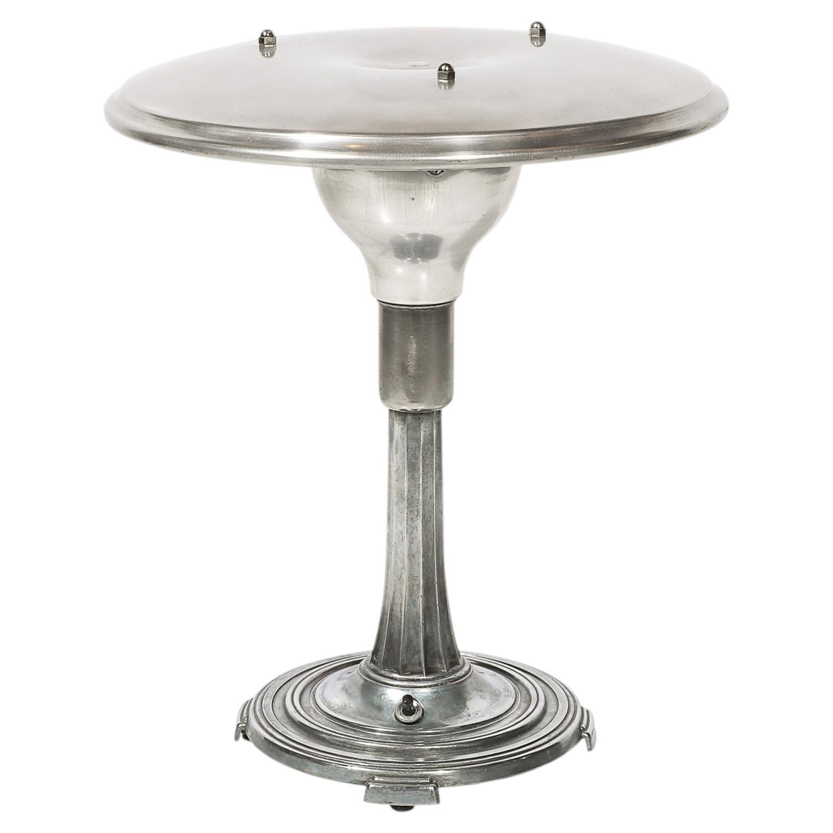 Art Deco Machine Age Saucer Form Polished Aluminum Table Lamp w/ Sculptural Base For Sale