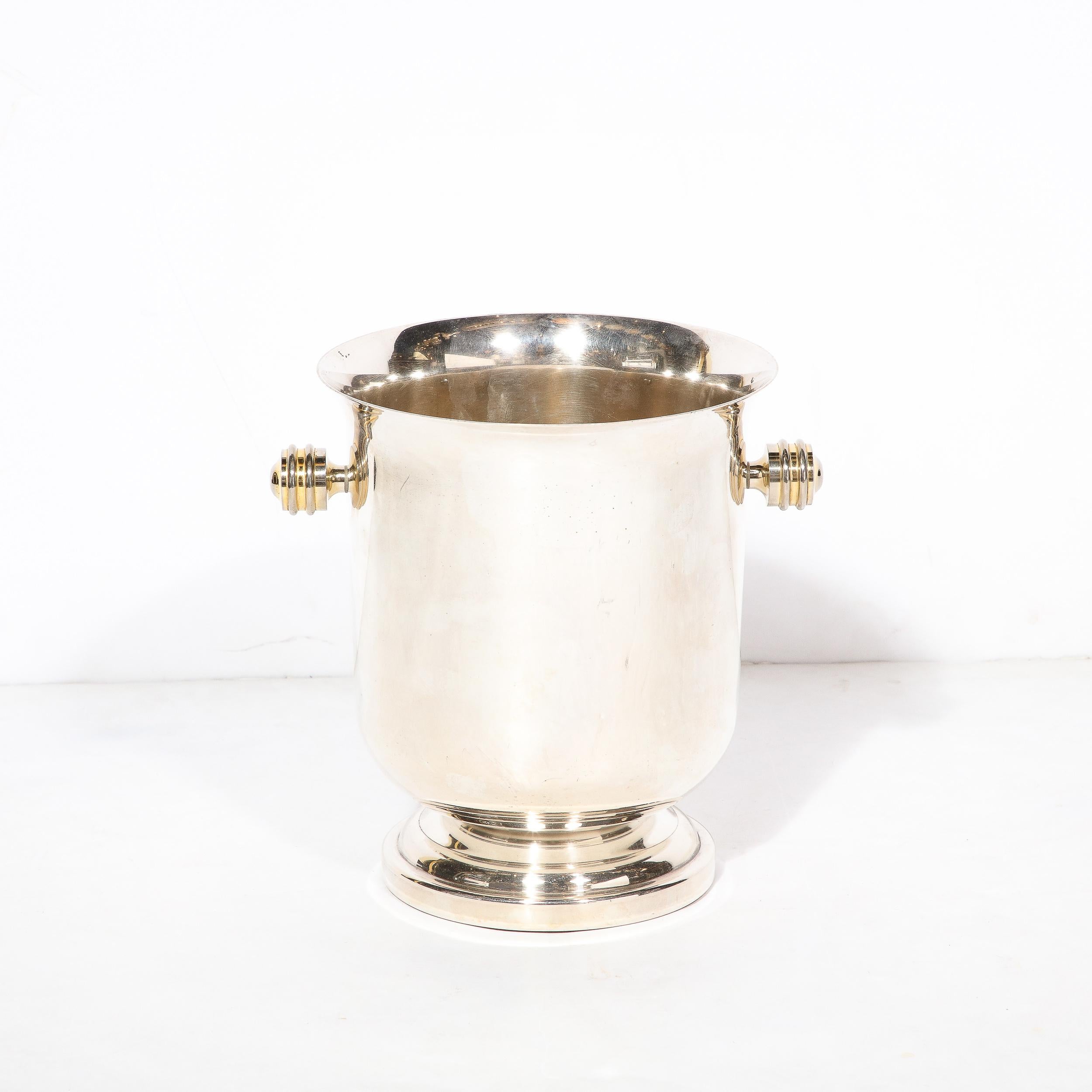 This beautiful Art Deco Machine Age Silver plate ice Bucket originates from France, Circa 1930. Featuring a curved and beautifully expansive opening that tapers inwards near the base, the handles of the piece are particularly beautiful, milled
