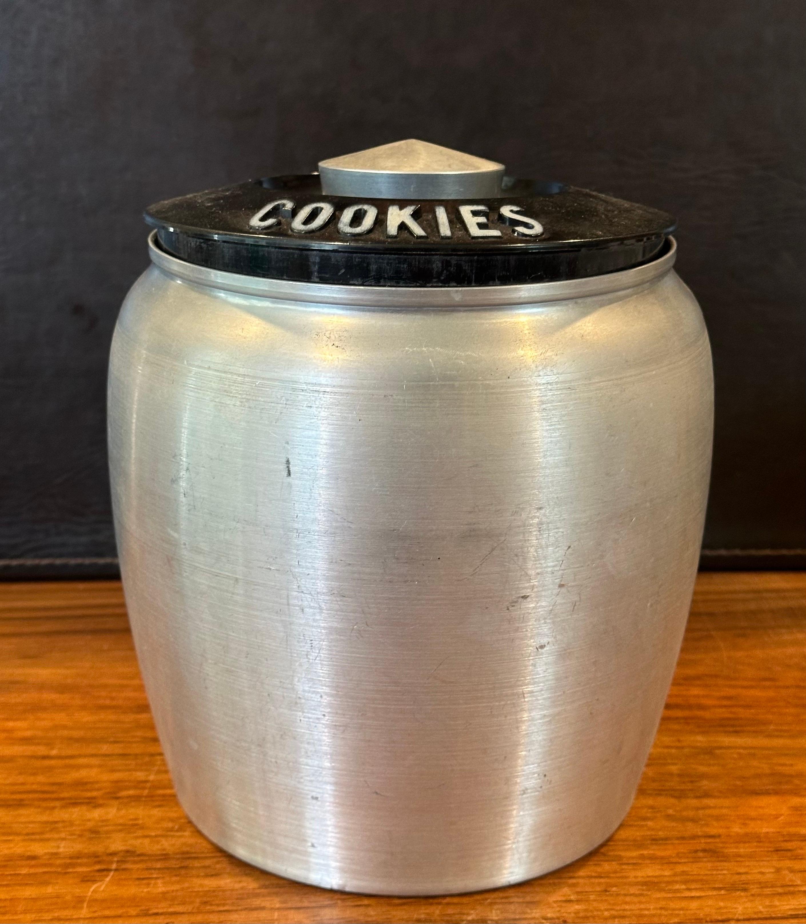 American Art Deco Machine Age Spun Aluminum Cookie Jar by RJX For Sale