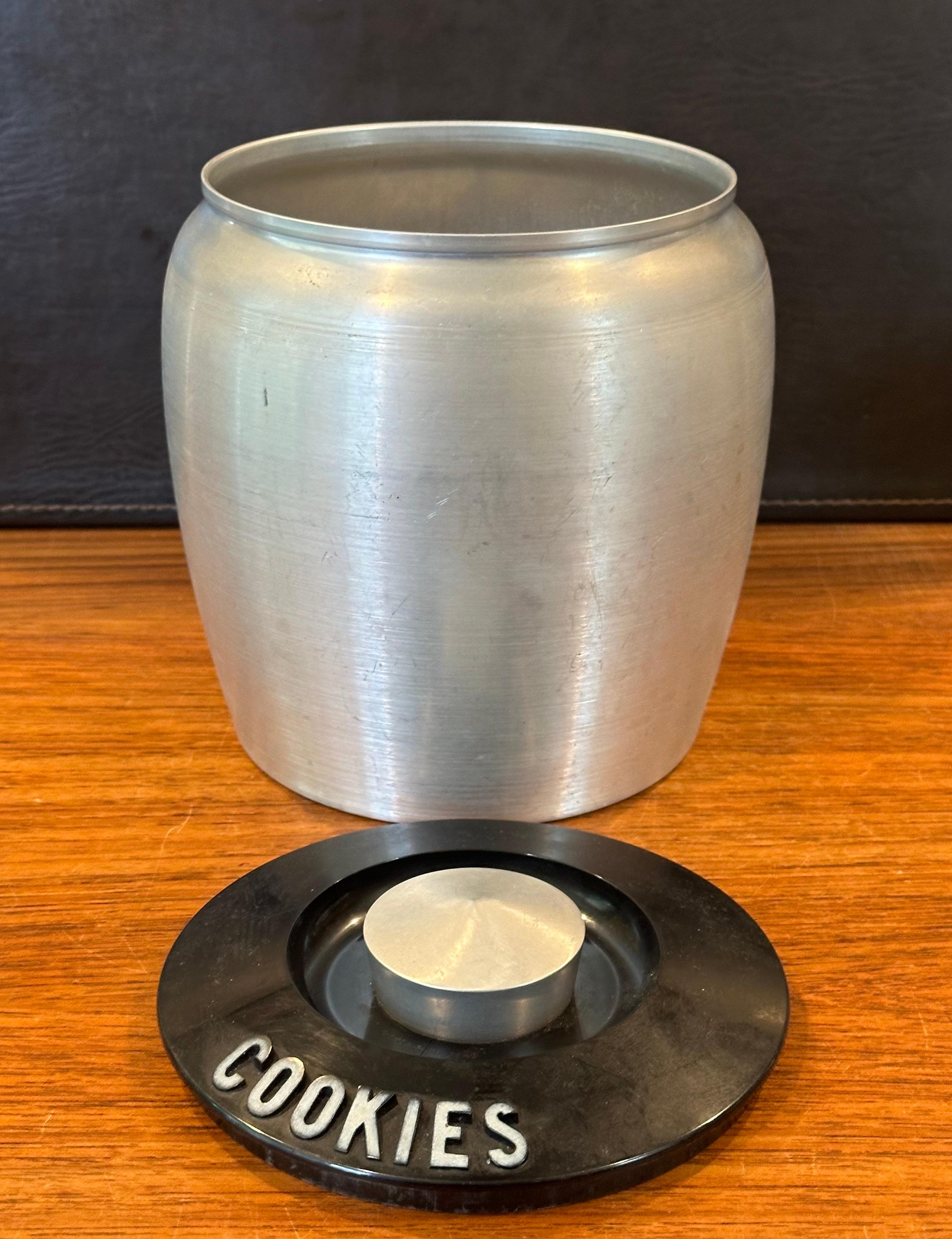 Cast Art Deco Machine Age Spun Aluminum Cookie Jar by RJX For Sale