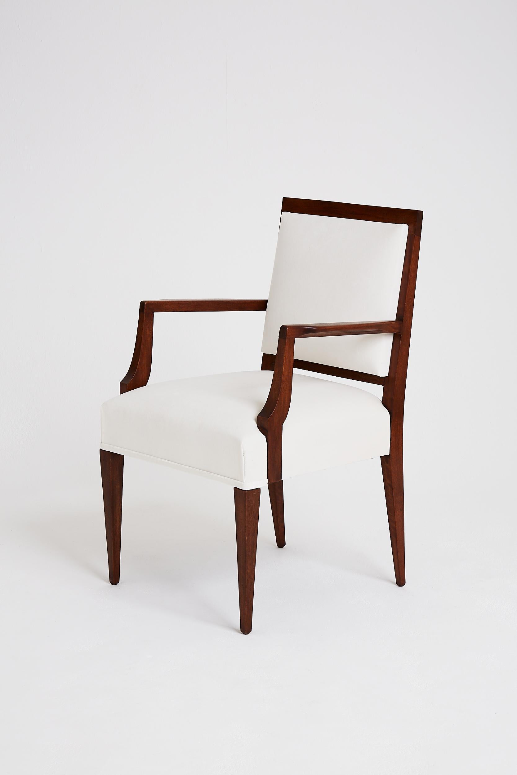 An Art Deco mahogany armchair.
Newly upholstered in white velvet.
France, circa 1935.