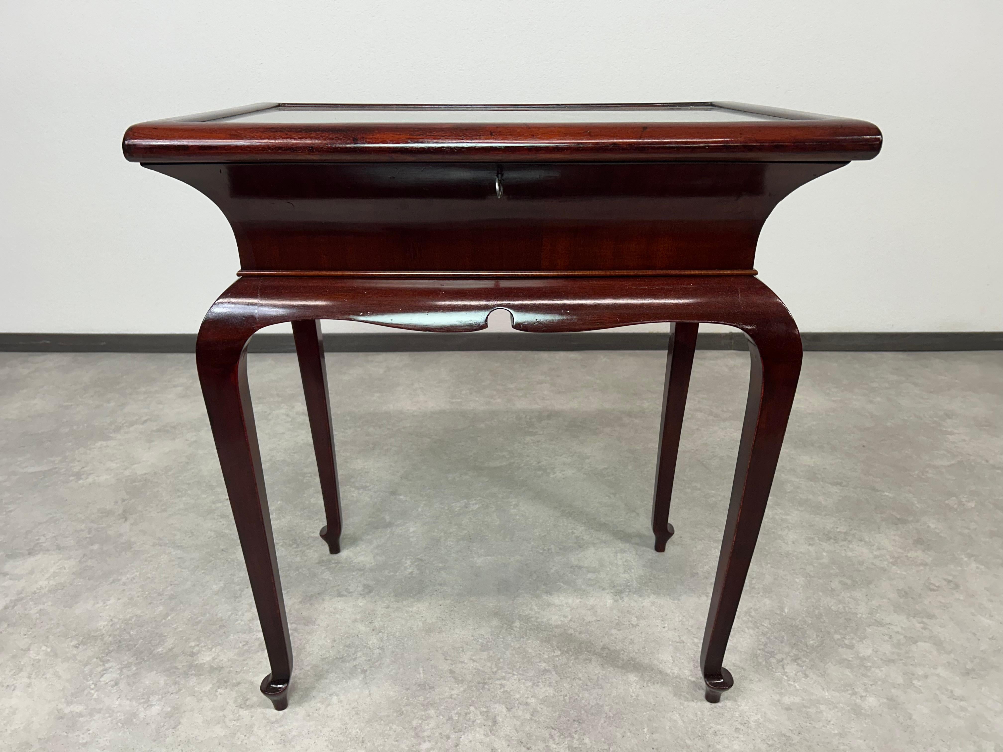 Art deco mahogany bijouterie display cabinet table. Professionally stained and repolished.