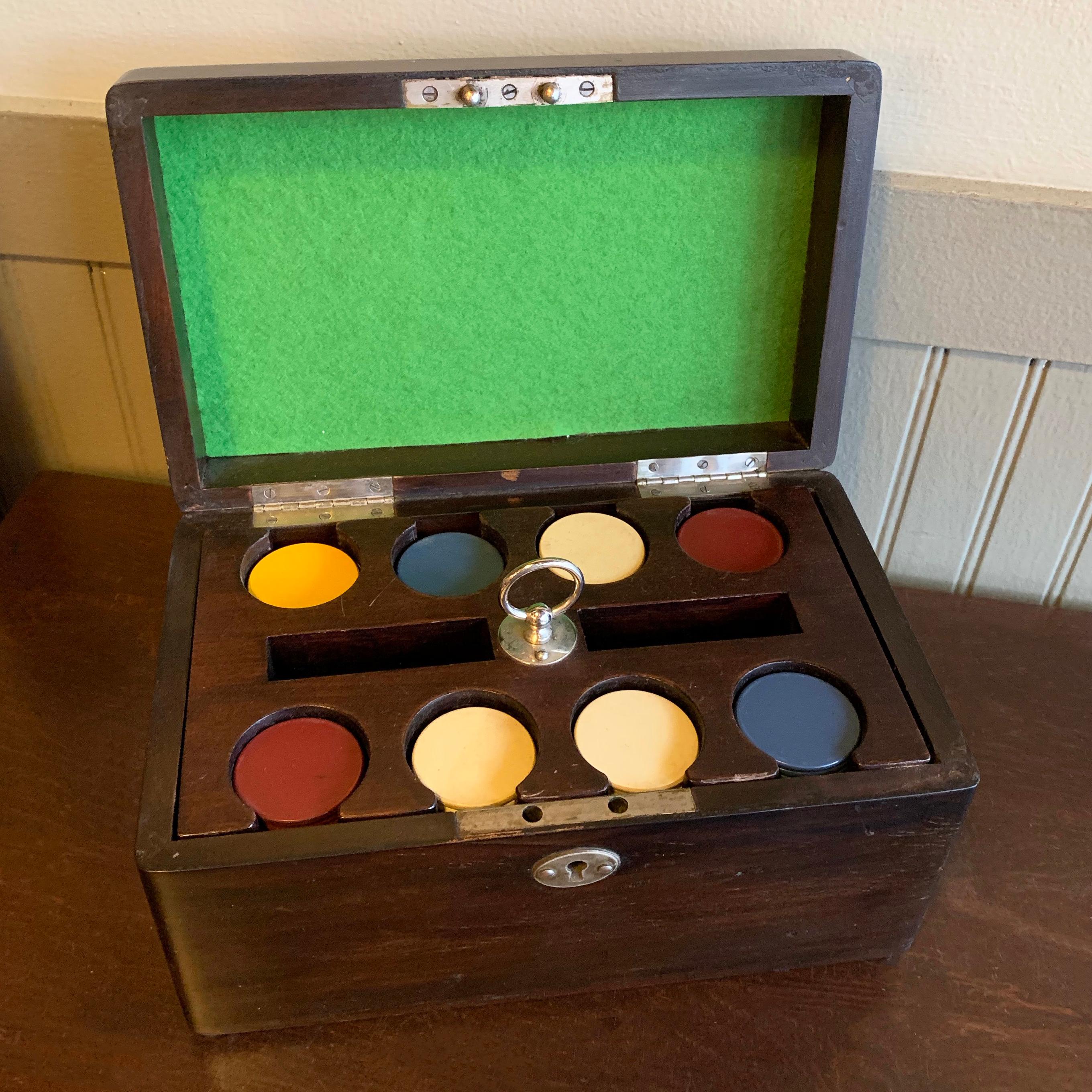 Art Deco, poker chip set features a mahogany box with pullout / pull-out chip caddy and melamine poker chips.