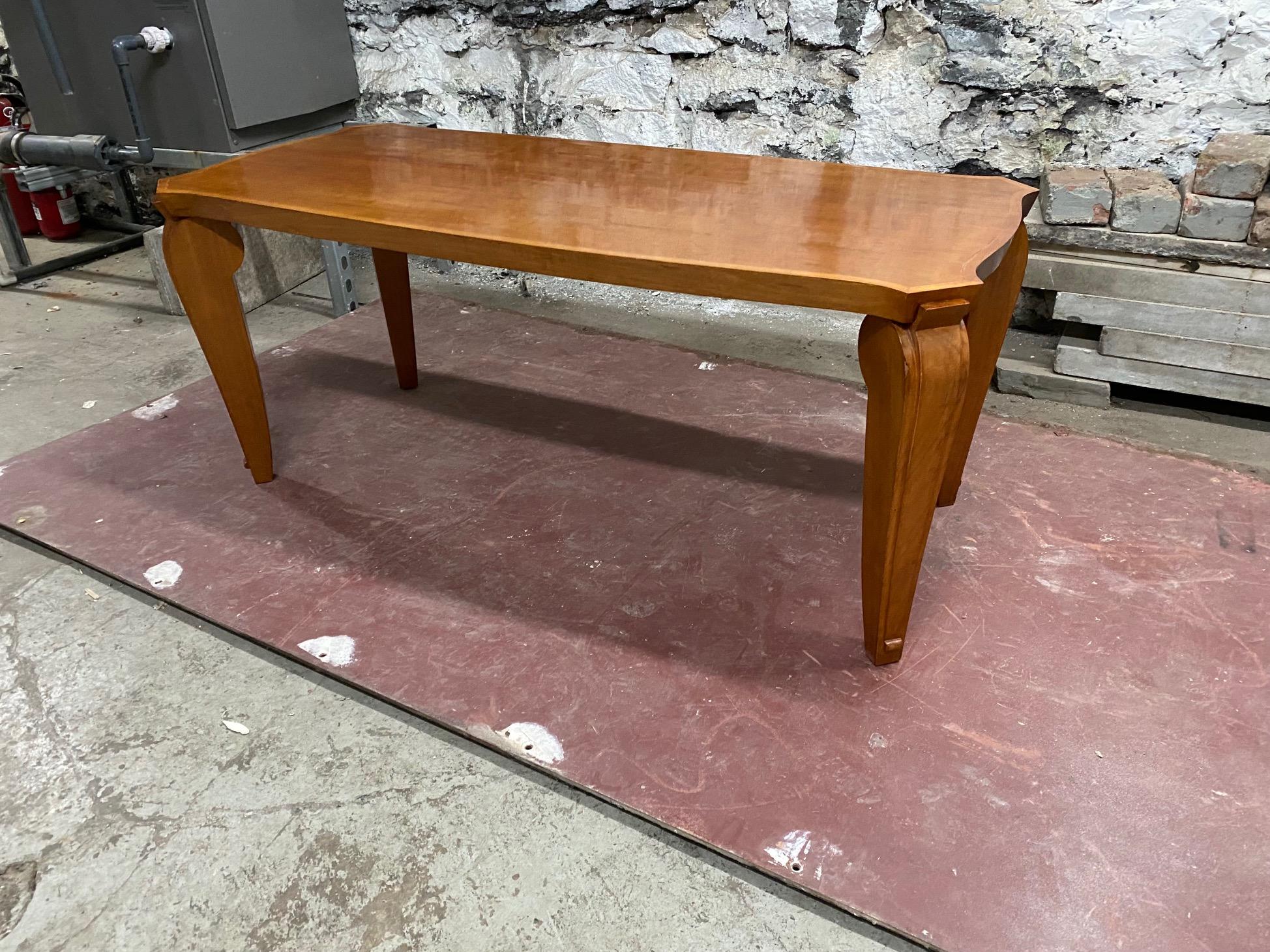 Art Deco mahogany coffee table by Andre Arbus.
Provenance: this buffet is part of a suite commissioned by Andre Arbus's personal physician .
