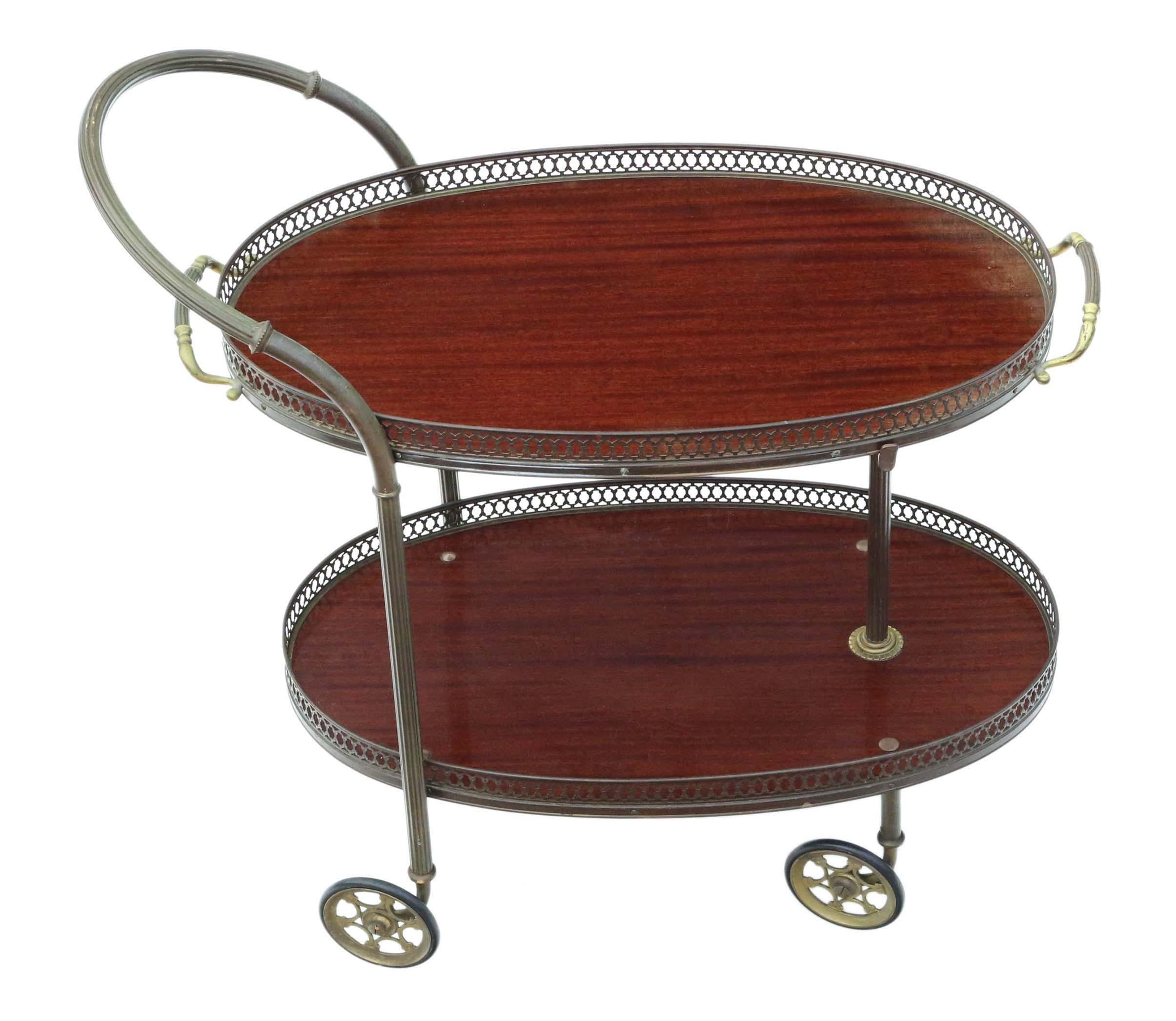 Art Deco mahogany dumb waiter buffet cake serving table or drinks trolley. Fantastic wheels!
A beautiful rare piece that shouts quality and is full of age charm and character. Lift off galleried serving tray.
No loose joints and no woodworm.
Would