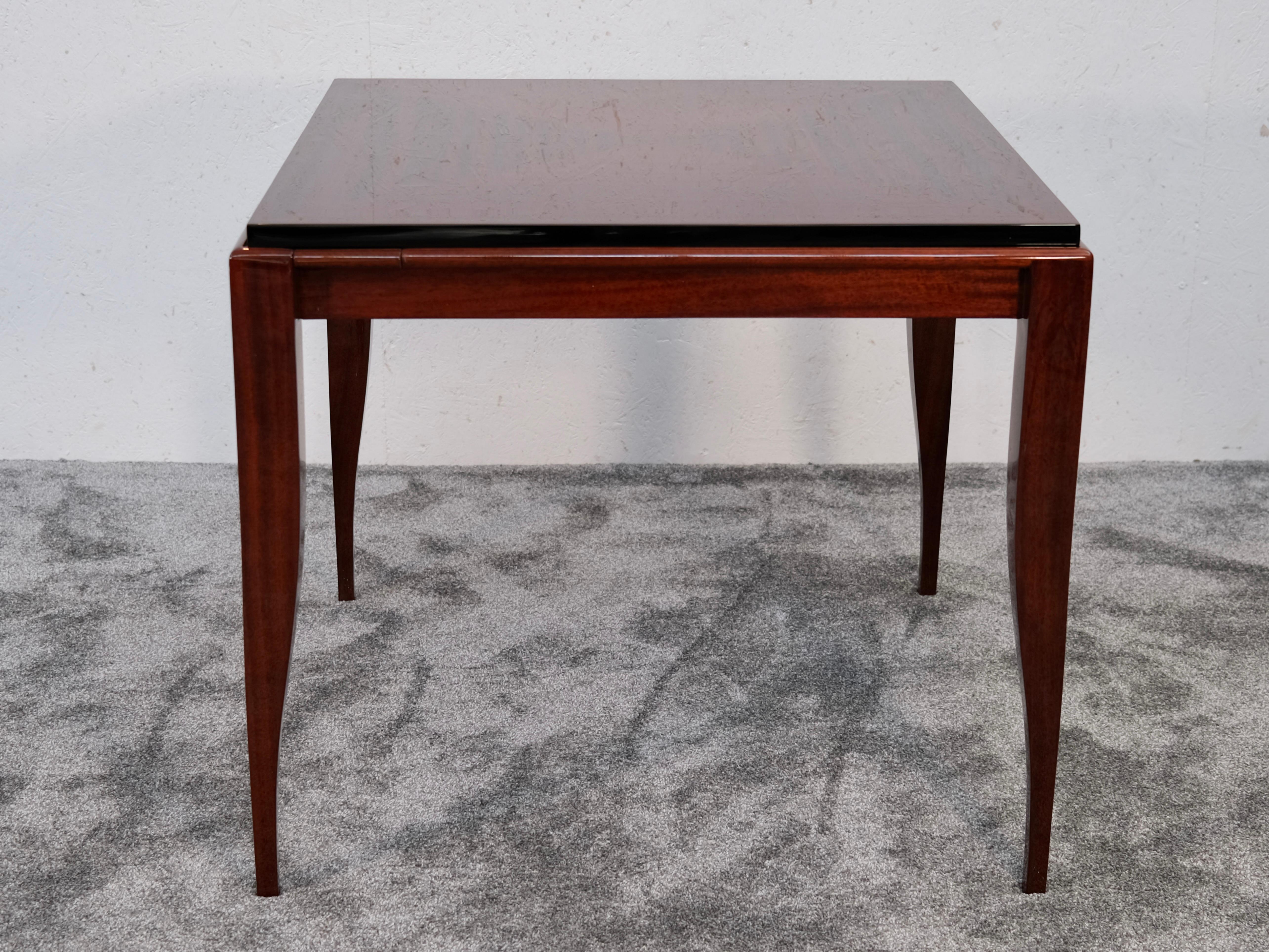 Art Deco Game Table Mahogany France 1930

A game table that offers more than just function – this rare Art Deco piece evokes the elegant world of 1930s French salons: the scent of cigars, the gleam of polished wood, a glass of cognac on the side,