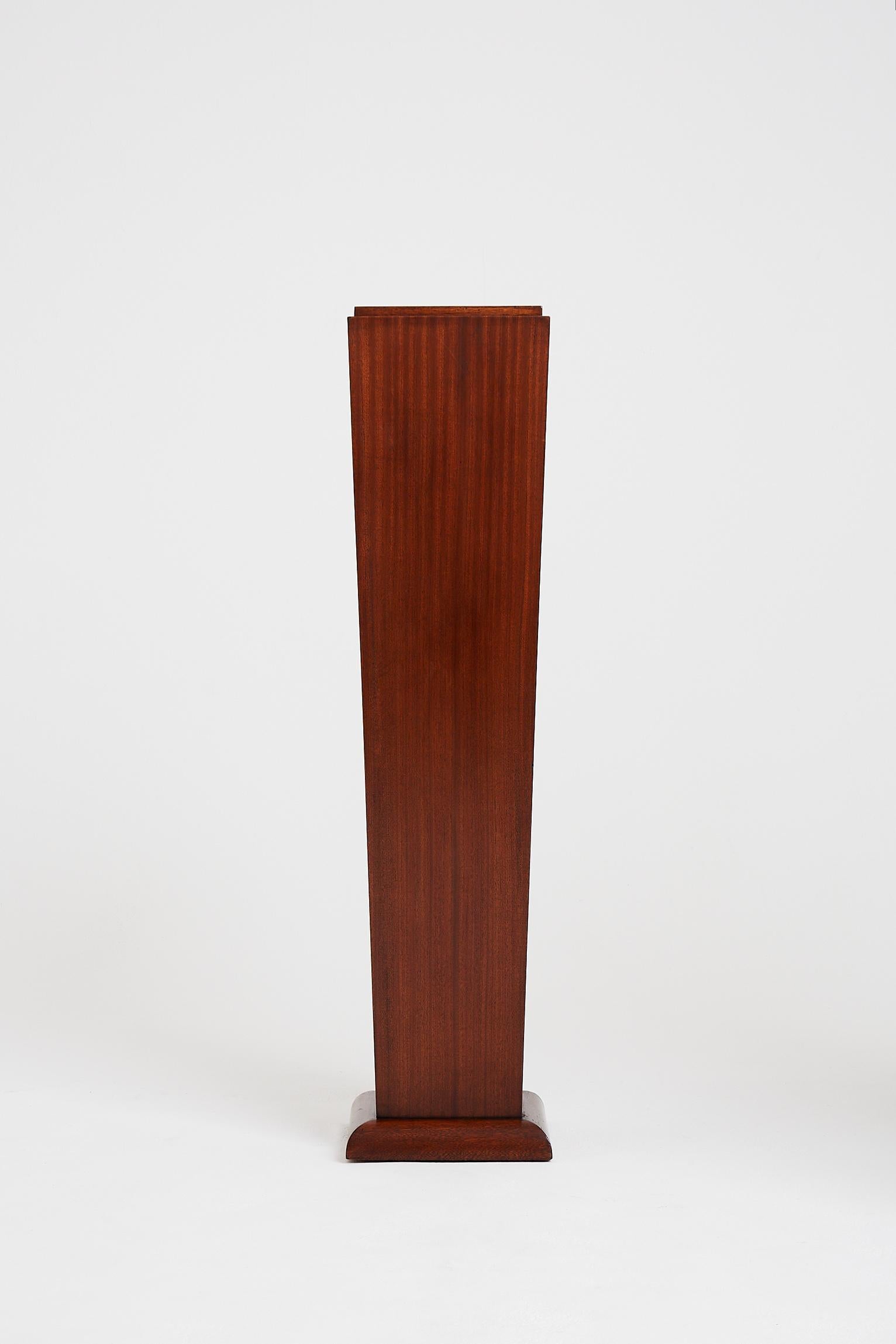 An Art Deco mahogany pedestal.
France, circa 1940.